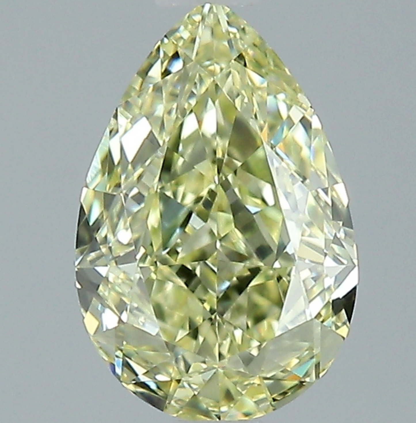 1.51 CT Pear Cut Fancy Light Yellow Natural VS1 Clarity Diamond.