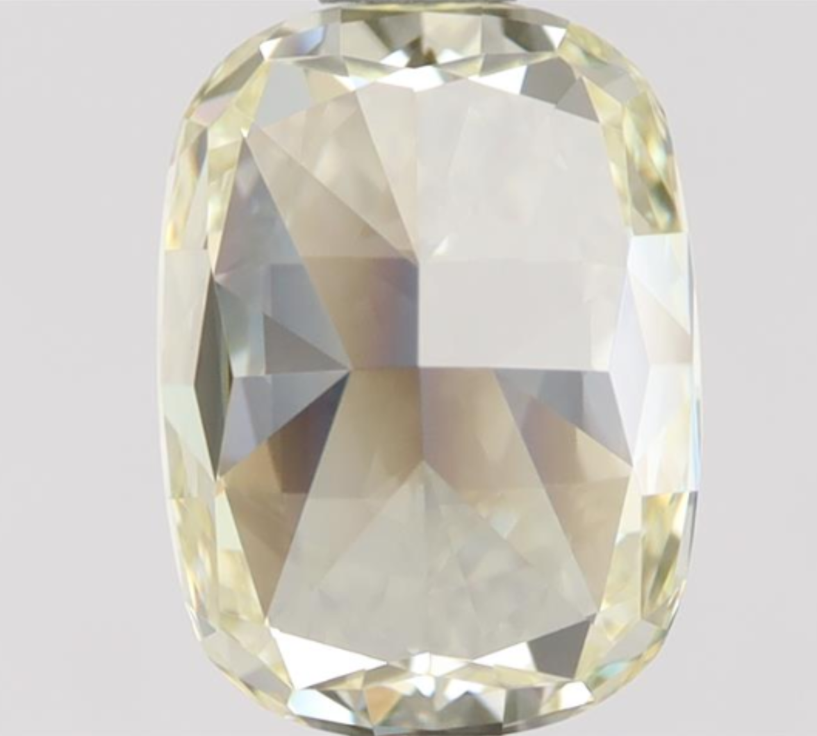 Natural 1.52 CT Cushion Modified Brilliant Cut Fancy Light Yellow Clarity Grade Internally Flawless Diamond.