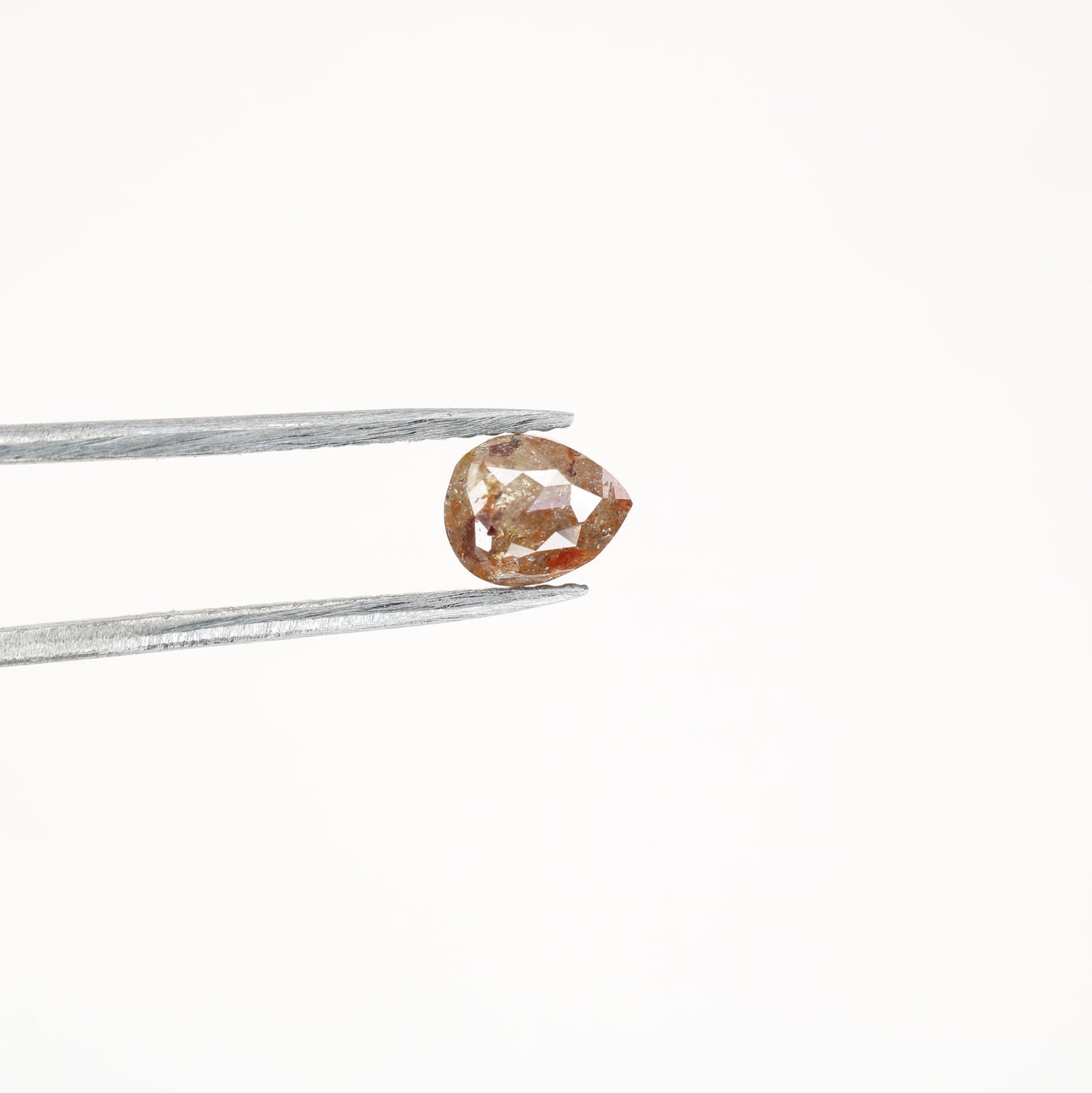 0.63 CT Red Pear Natural Loose Diamond for a Captivating Anniversary Ring: Rustic Pear Diamond Engagement Ring Design - JayKrishna Diamond