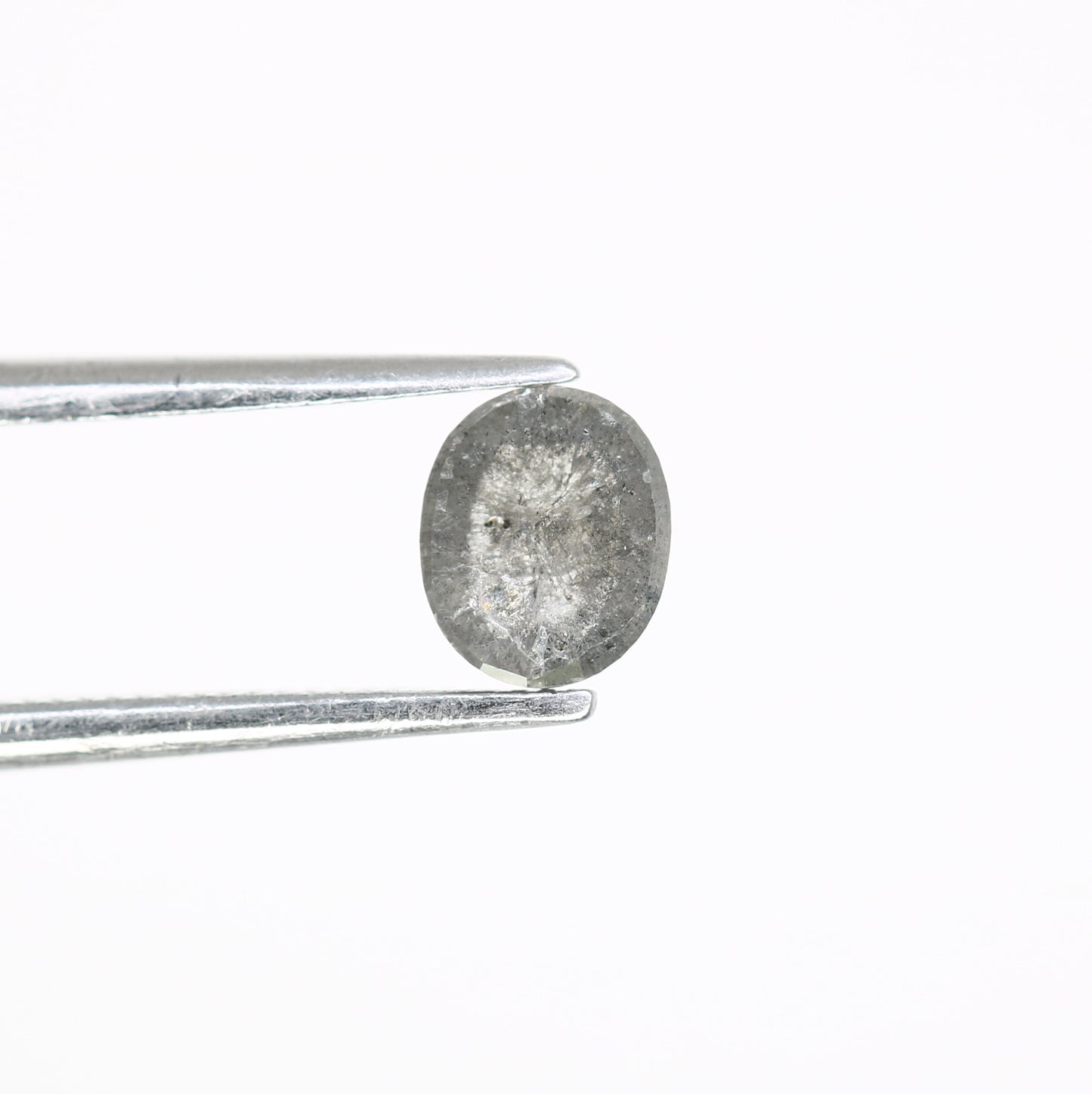 0.60 Carat Oval Salt and Pepper Diamond: Unique Gemstone for Custom Engagement Rings - JayKrishna Diamond