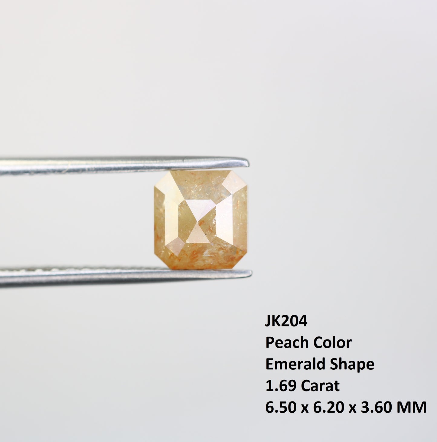 1.69 CT Emerald Shape Peach Diamond For Engagement Ring - JayKrishna Diamond