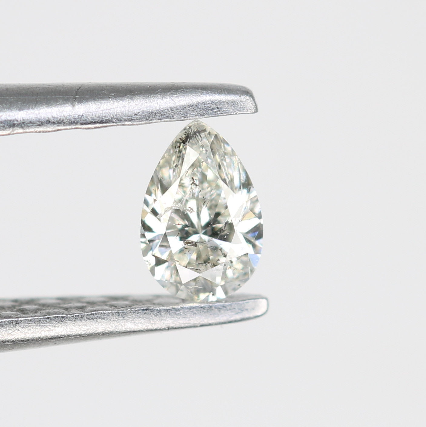0.15 CT Salt and Pepper Pear Shape Diamond – Perfect for Engagement Rings and Custom Jewelry - JayKrishna Diamond