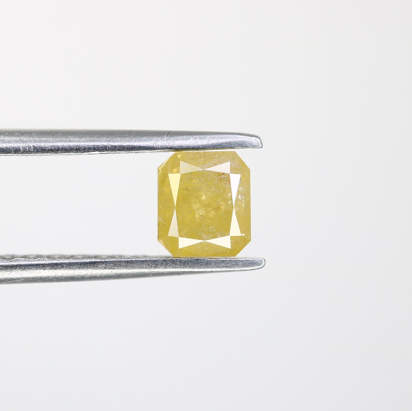 0.61 CT Asscher Shape Yellow Diamond for a Stunning Engagement Ring: Unique Gemstone Jewelry Piece - JayKrishna Diamond
