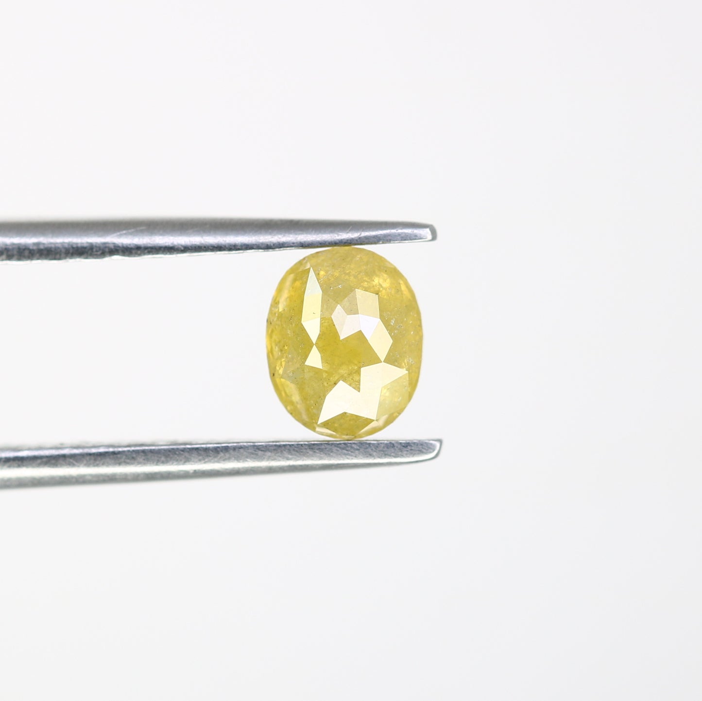 0.58 CT Loose Yellow Oval-Shaped Diamond – Beautiful Gem for Custom Engagement Rings - JayKrishna Diamond