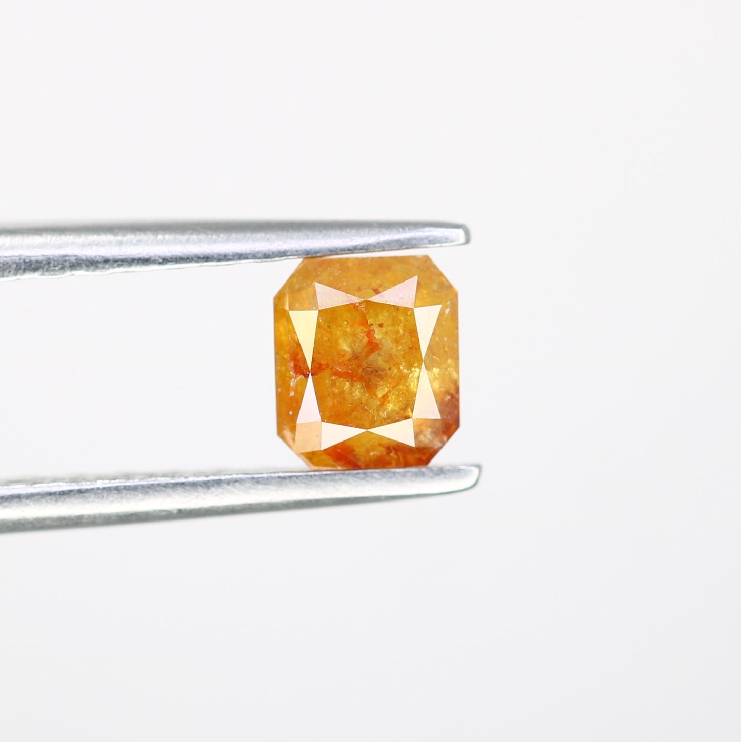 0.64 CT Emerald Shape Peach Diamond for a Stunning Engagement Ring: Distinctive Gemstone Jewelry Piece - JayKrishna Diamond