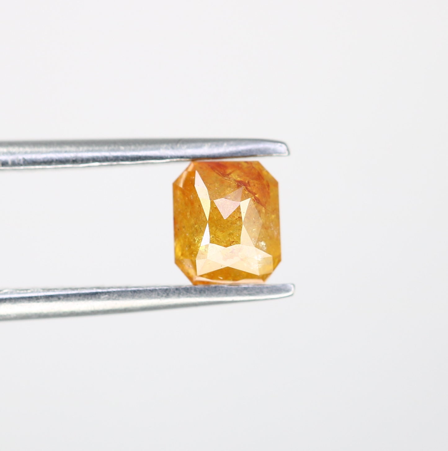 0.64 CT Emerald Shape Peach Diamond for a Stunning Engagement Ring: Distinctive Gemstone Jewelry Piece - JayKrishna Diamond
