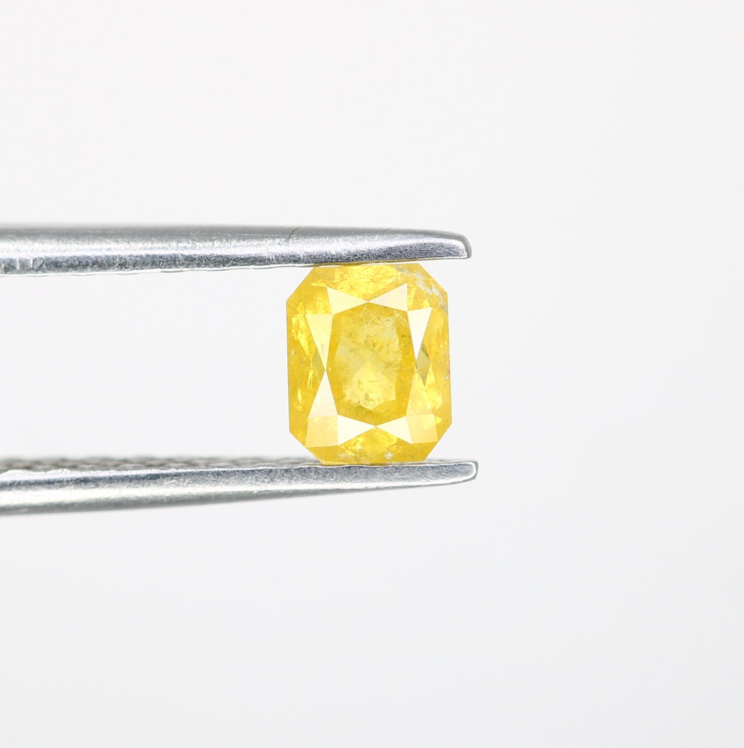 0.58 CT Natural Yellow Emerald-Shaped Diamond – Elegant Loose Gem for Stunning Engagement Rings - JayKrishna Diamond
