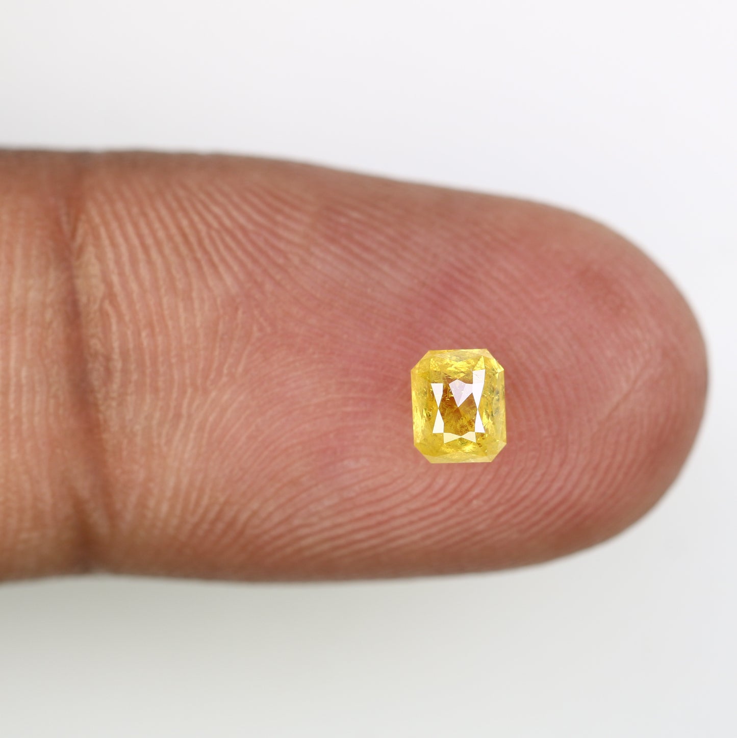0.58 CT Natural Yellow Emerald-Shaped Diamond – Elegant Loose Gem for Stunning Engagement Rings - JayKrishna Diamond