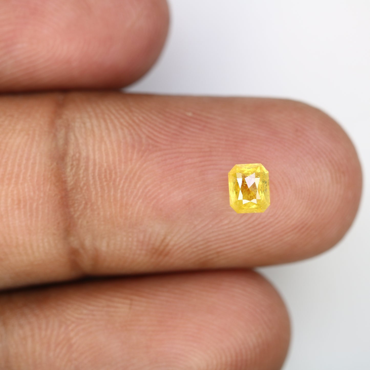 0.58 CT Natural Yellow Emerald-Shaped Diamond – Elegant Loose Gem for Stunning Engagement Rings - JayKrishna Diamond