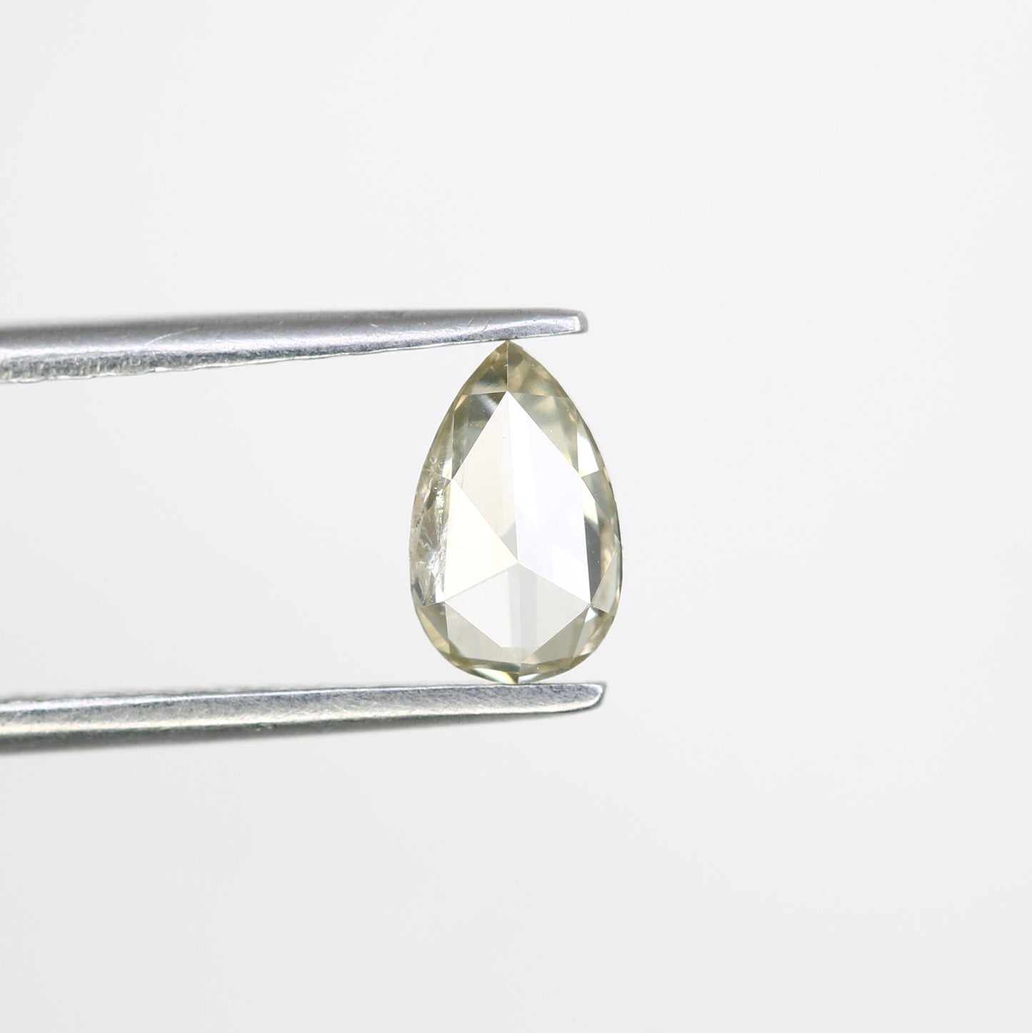 0.57 CT Fancy Light Yellow Pear-Shaped Diamond – Radiant Loose Gem for Celestial Galaxy Rings - JayKrishna Diamond