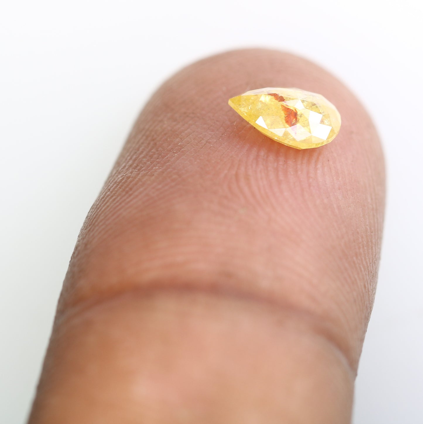 0.62 CT Pear Cut Natural Yellow Diamond (6.90 MM) for a Striking Engagement Ring: Distinctive Gemstone Jewelry Piece - JayKrishna Diamond