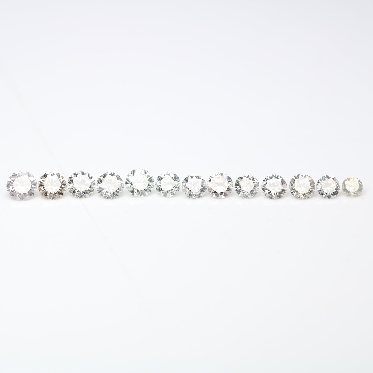 0.61 CT Round Brilliant Cut Light Mix Diamonds (1.70 to 2.60 MM) for an Elegant Engagement Ring: Unique Gemstone Collection - JayKrishna Diamond