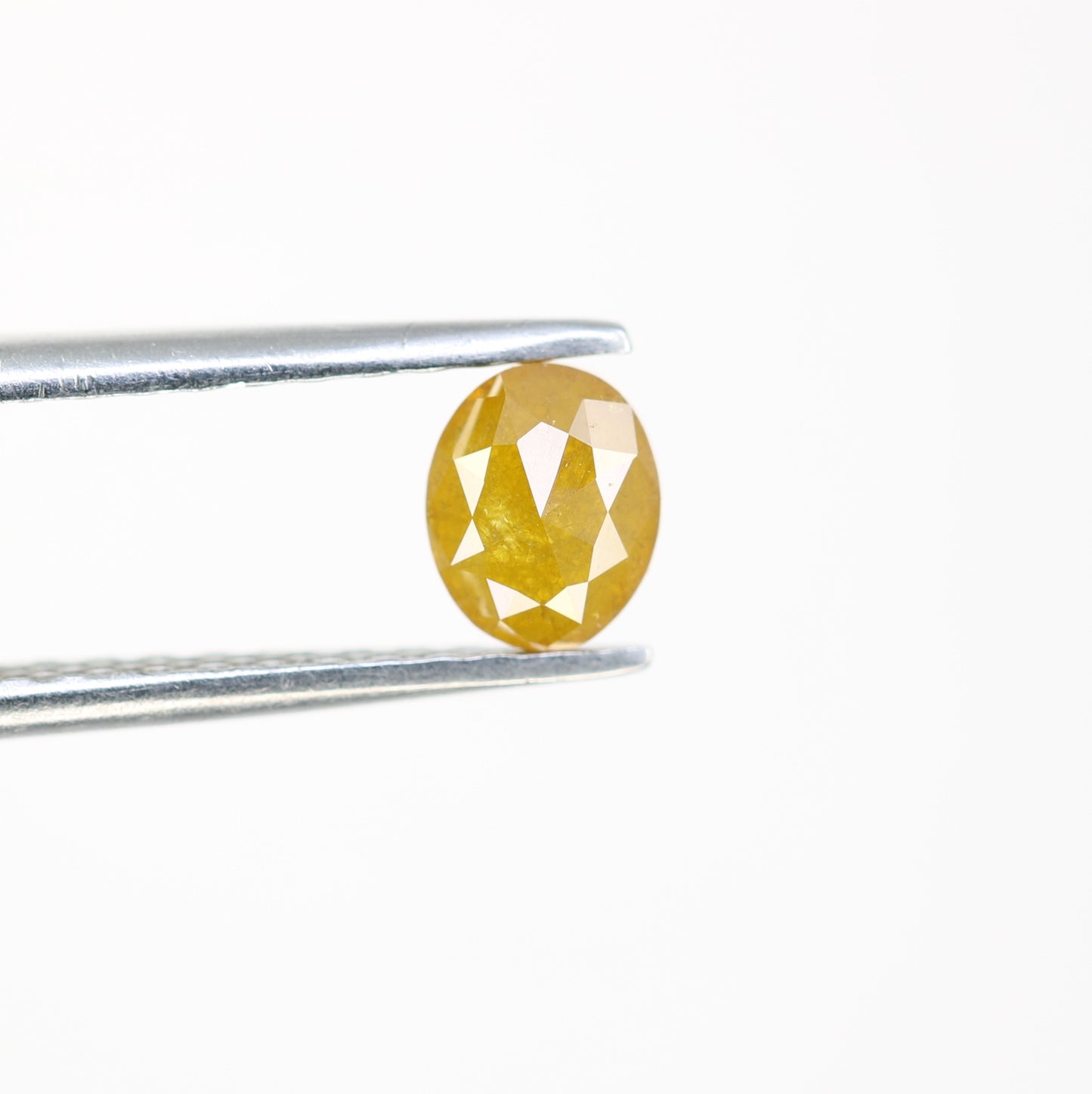 0.62 CT Fancy Yellow Oval Shape Loose Diamond (5.50 MM) for a Stunning Wedding Ring: Distinctive Gemstone Jewelry Piece - JayKrishna Diamond