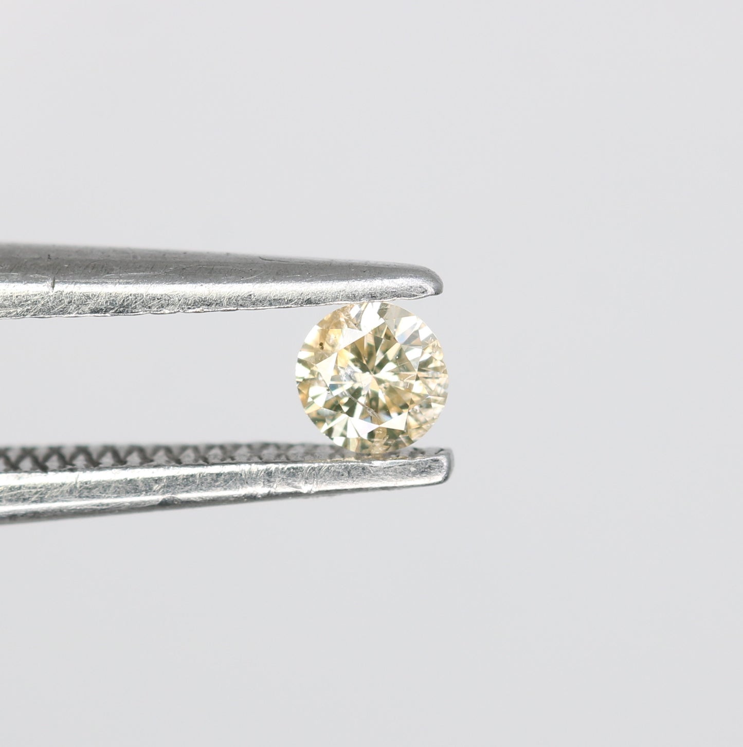 0.09 CT Natural Light Yellow Round Brilliant Cut Salt and Pepper Diamond for Custom Engagement Rings & Unique Jewelry - JayKrishna Diamond