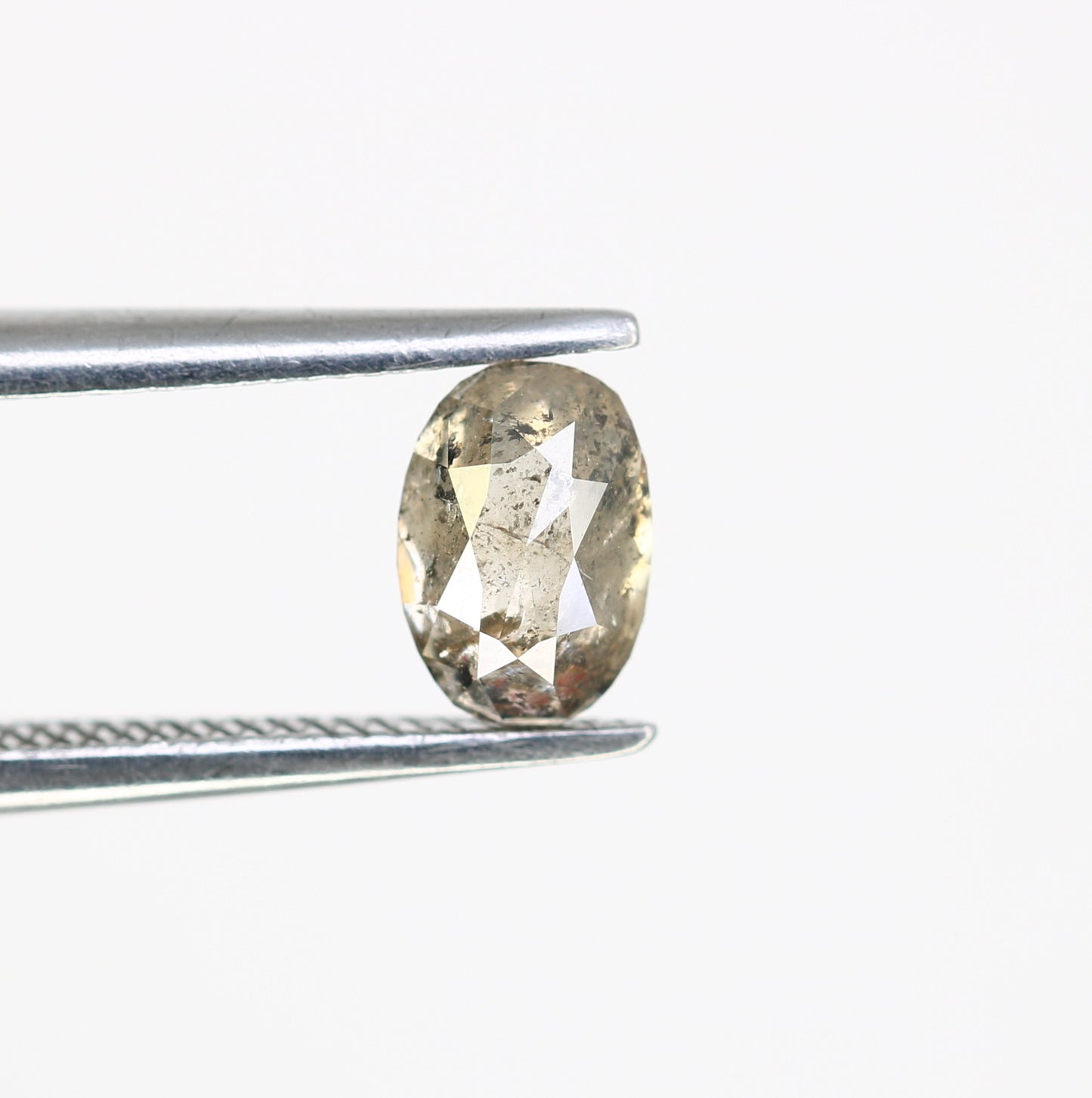 0.64 CT 6 MM Polished Oval Shape Natural Salt and Pepper Loose Diamond for a Distinctive Promise Ring: Elegant Gemstone Jewelry Piece - JayKrishna Diamond