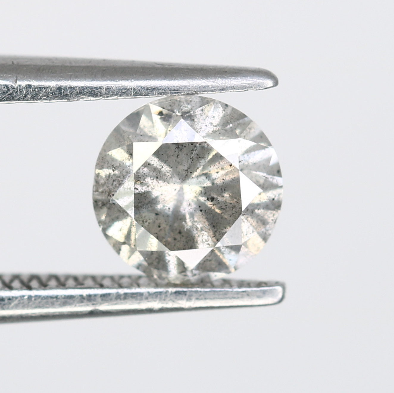 0.60 CT Salt and Pepper Round Brilliant Cut Diamond for an Elegant Engagement Ring: Unique Gemstone Jewelry - JayKrishna Diamond