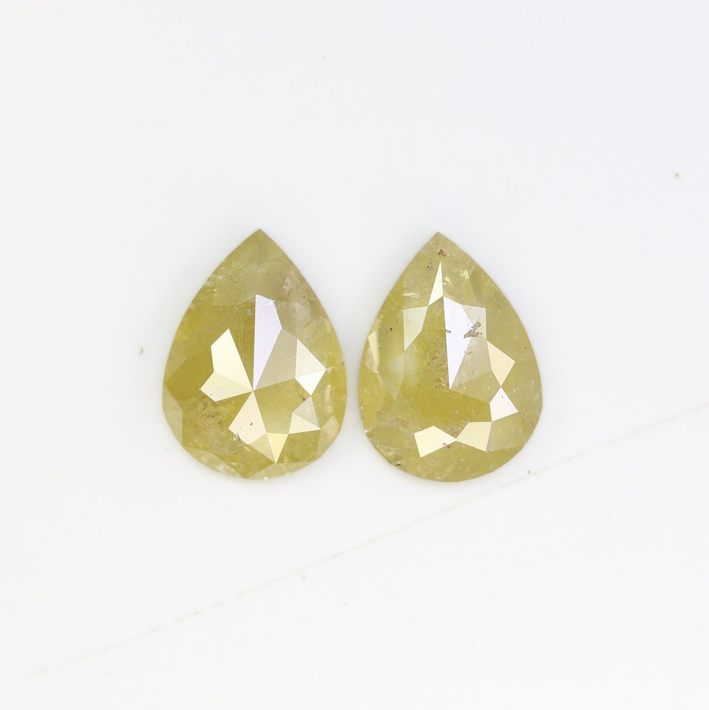 2.94 Carat Natural Yellow Rustic Diamond Pair Fancy Pear Shaped Diamond - JayKrishna Diamond