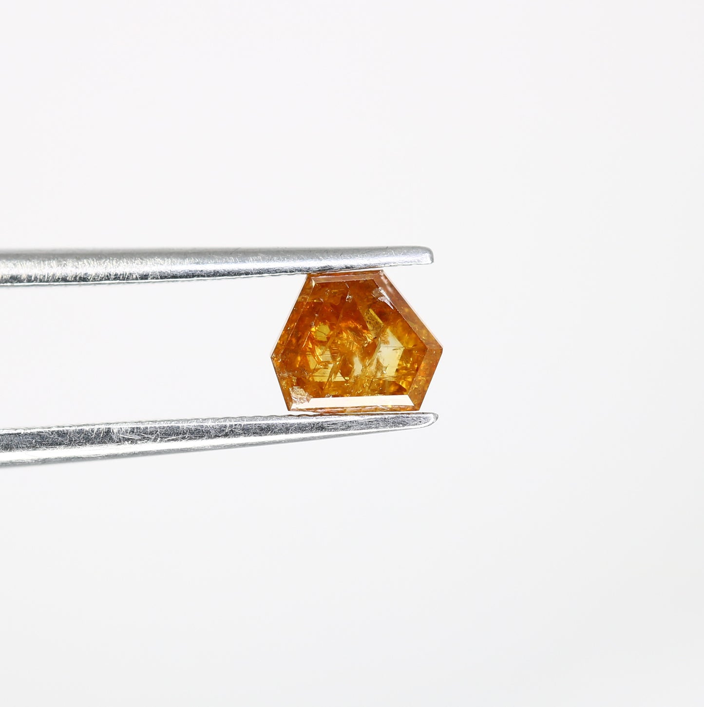0.69 Carat 4.90 MM Orange Fancy Triangle Shape Natural Diamond For Wedding Ring - JayKrishna Diamond