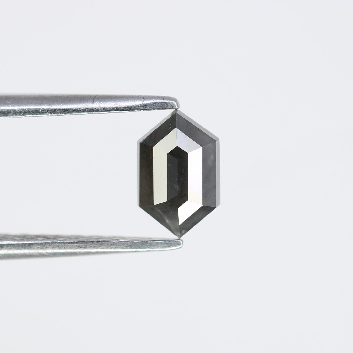 0.61 CT Elongated Hexagon Cut Black Diamond for a Unique Engagement Ring: Stylish Gemstone Jewelry Choice - JayKrishna Diamond
