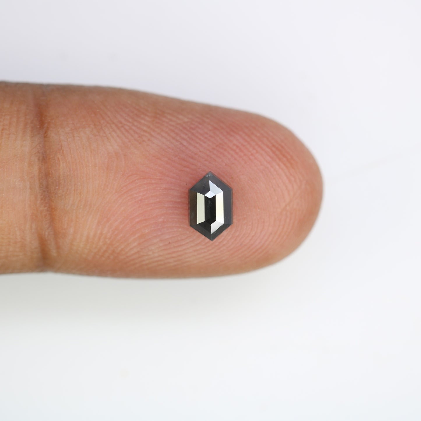 0.61 CT Elongated Hexagon Cut Black Diamond for a Unique Engagement Ring: Stylish Gemstone Jewelry Choice - JayKrishna Diamond