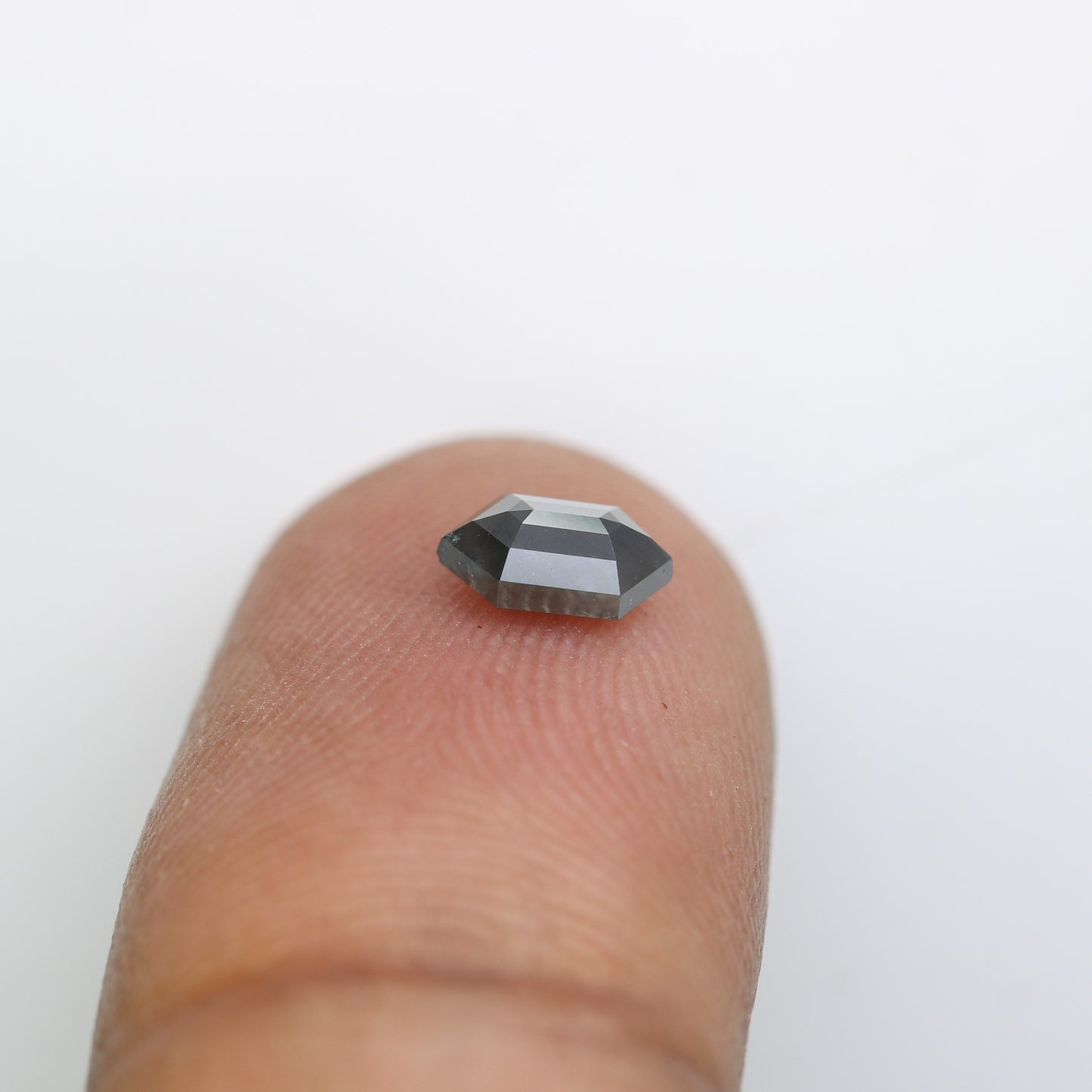 0.61 CT Elongated Hexagon Cut Black Diamond for a Unique Engagement Ring: Stylish Gemstone Jewelry Choice - JayKrishna Diamond
