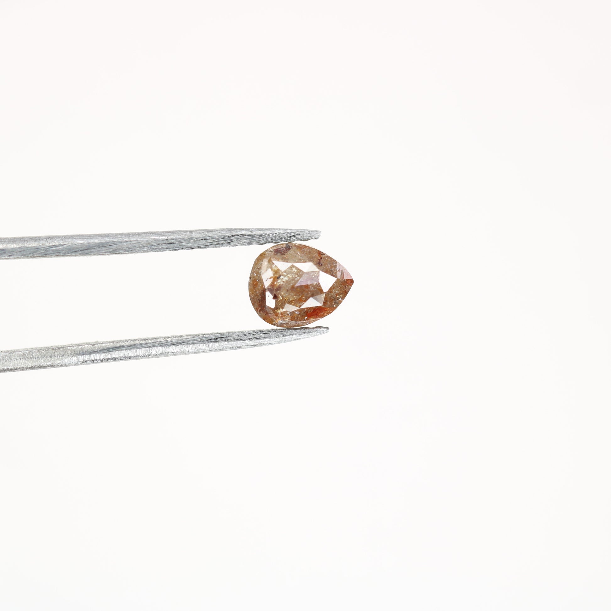 0.63 CT Red Pear Natural Loose Diamond for a Captivating Anniversary Ring: Rustic Pear Diamond Engagement Ring Design - JayKrishna Diamond