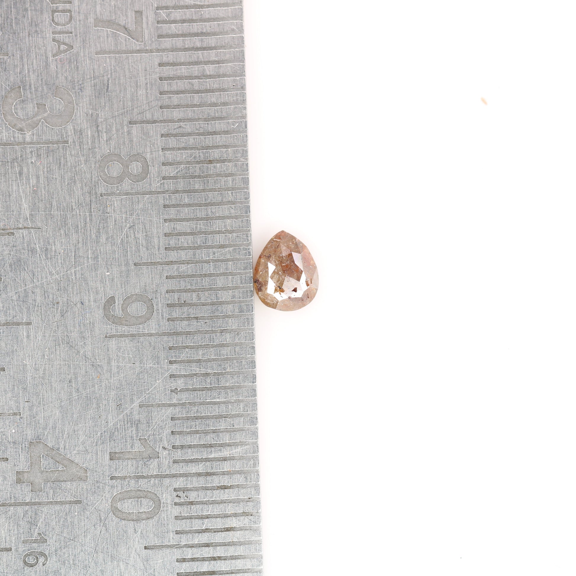 0.63 CT Red Pear Natural Loose Diamond for a Captivating Anniversary Ring: Rustic Pear Diamond Engagement Ring Design - JayKrishna Diamond