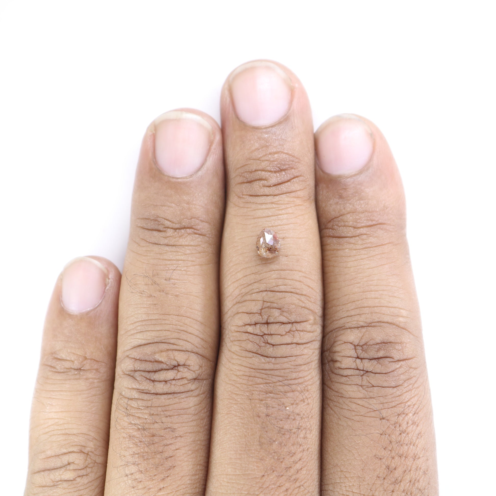 0.63 CT Red Pear Natural Loose Diamond for a Captivating Anniversary Ring: Rustic Pear Diamond Engagement Ring Design - JayKrishna Diamond