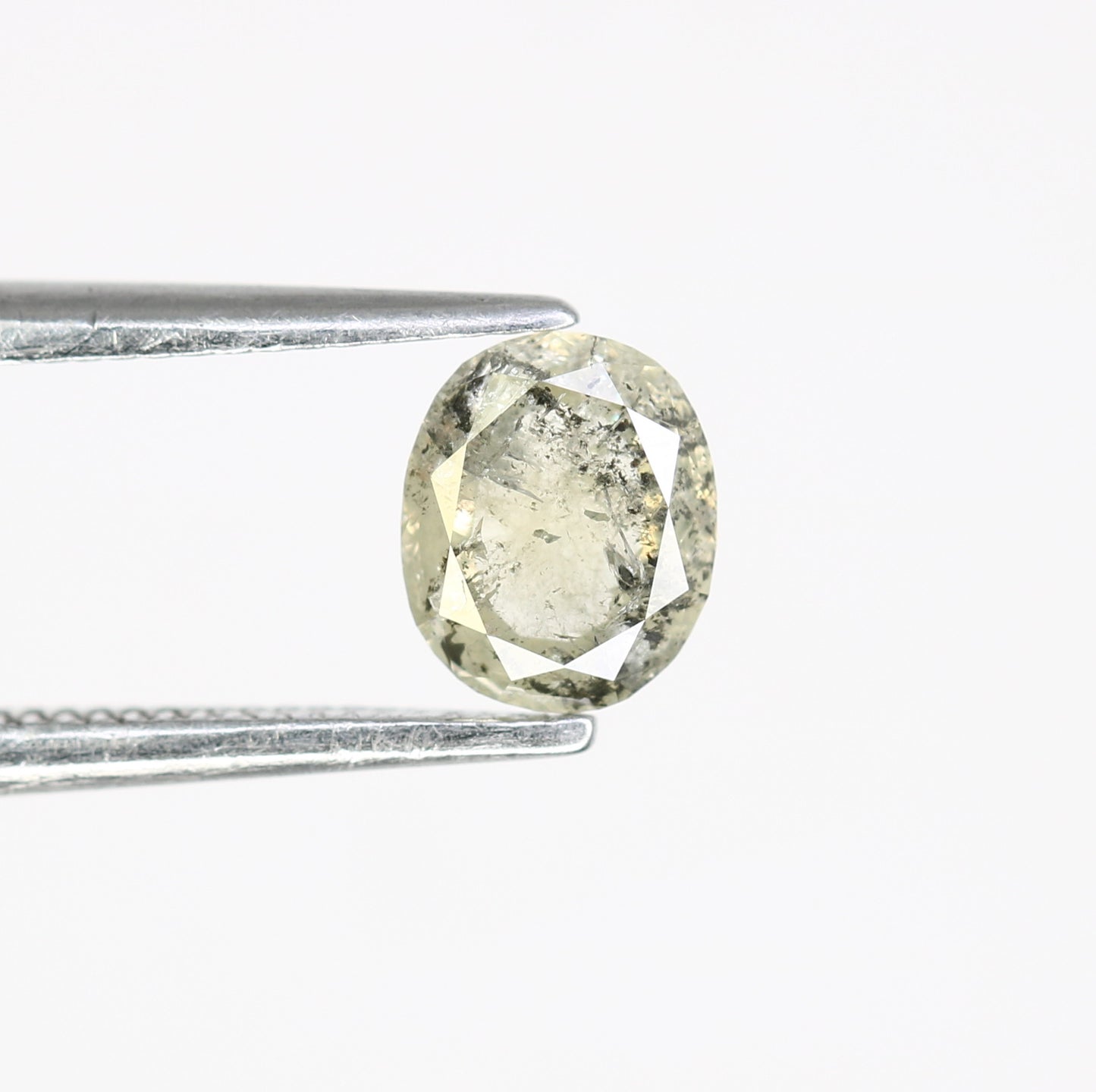 0.61 CT Salt and Pepper Oval Cut Diamond (5.80 MM) for Exquisite Designer Jewelry: Distinctive Gemstone Treasure - JayKrishna Diamond
