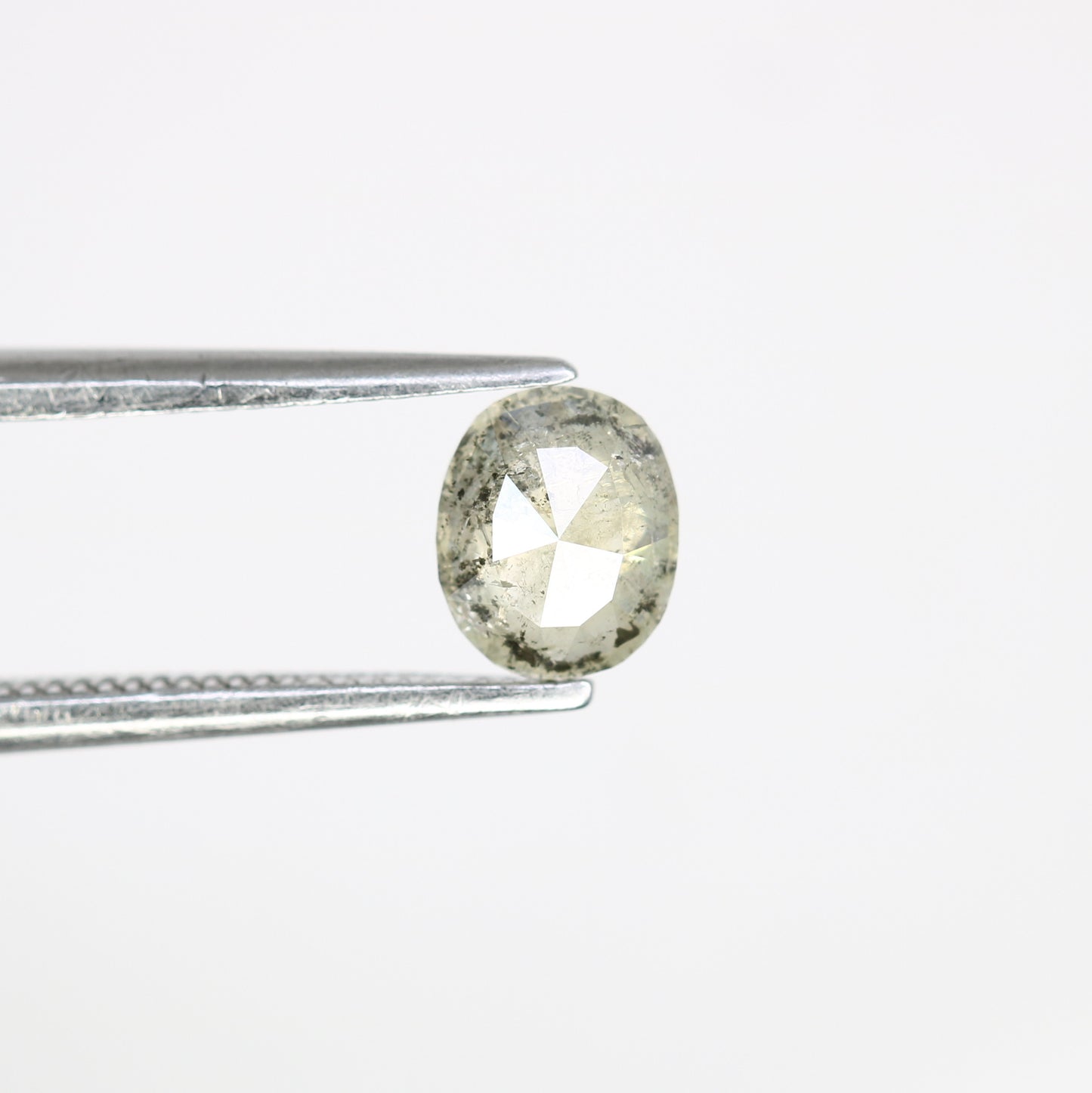 0.61 CT Salt and Pepper Oval Cut Diamond (5.80 MM) for Exquisite Designer Jewelry: Distinctive Gemstone Treasure - JayKrishna Diamond