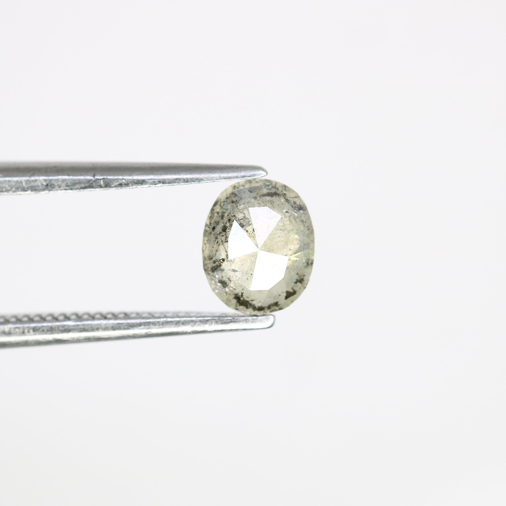 0.61 CT Salt and Pepper Oval Cut Diamond (5.80 MM) for Exquisite Designer Jewelry: Distinctive Gemstone Treasure - JayKrishna Diamond