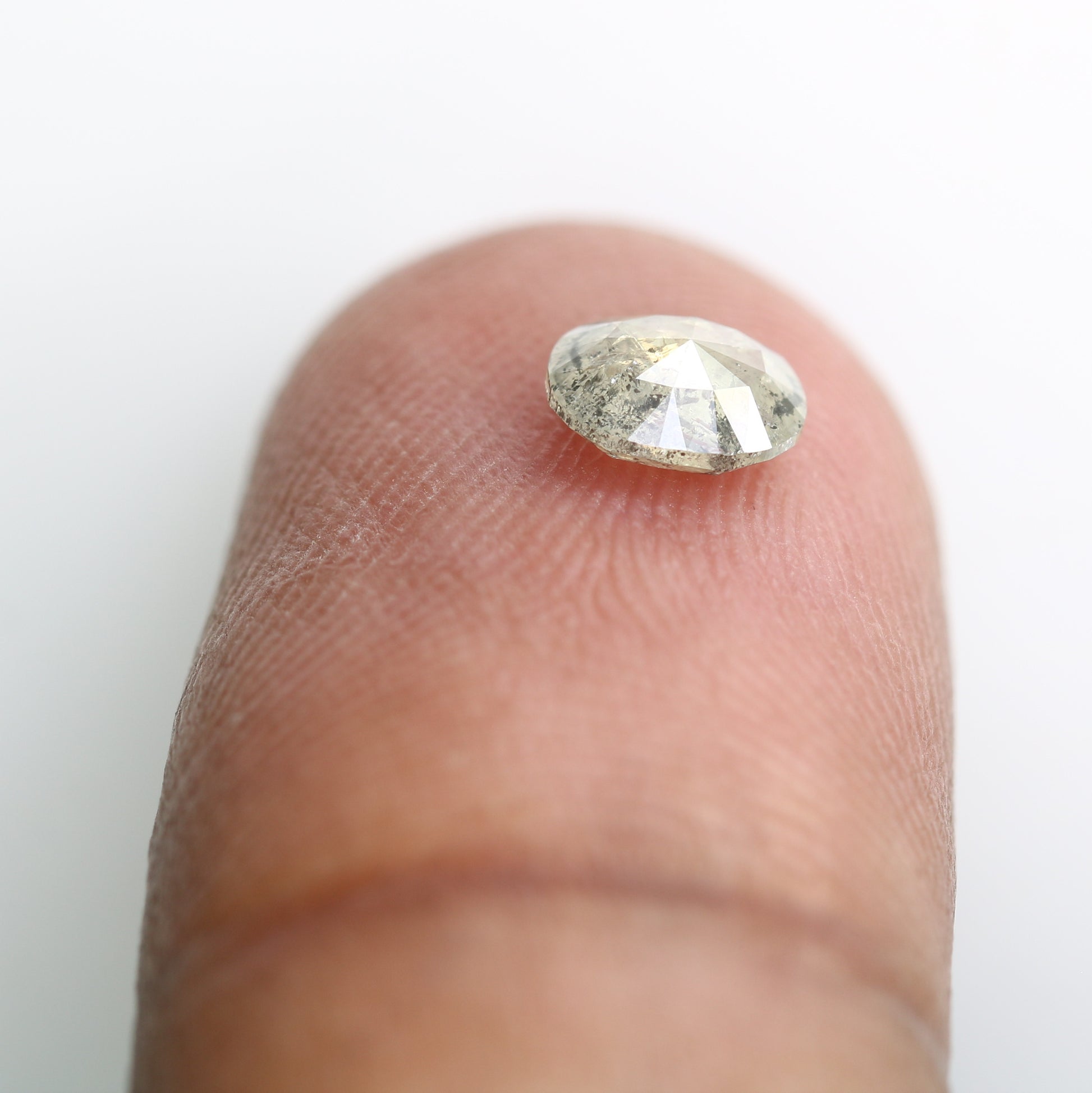 0.61 CT Salt and Pepper Oval Cut Diamond (5.80 MM) for Exquisite Designer Jewelry: Distinctive Gemstone Treasure - JayKrishna Diamond