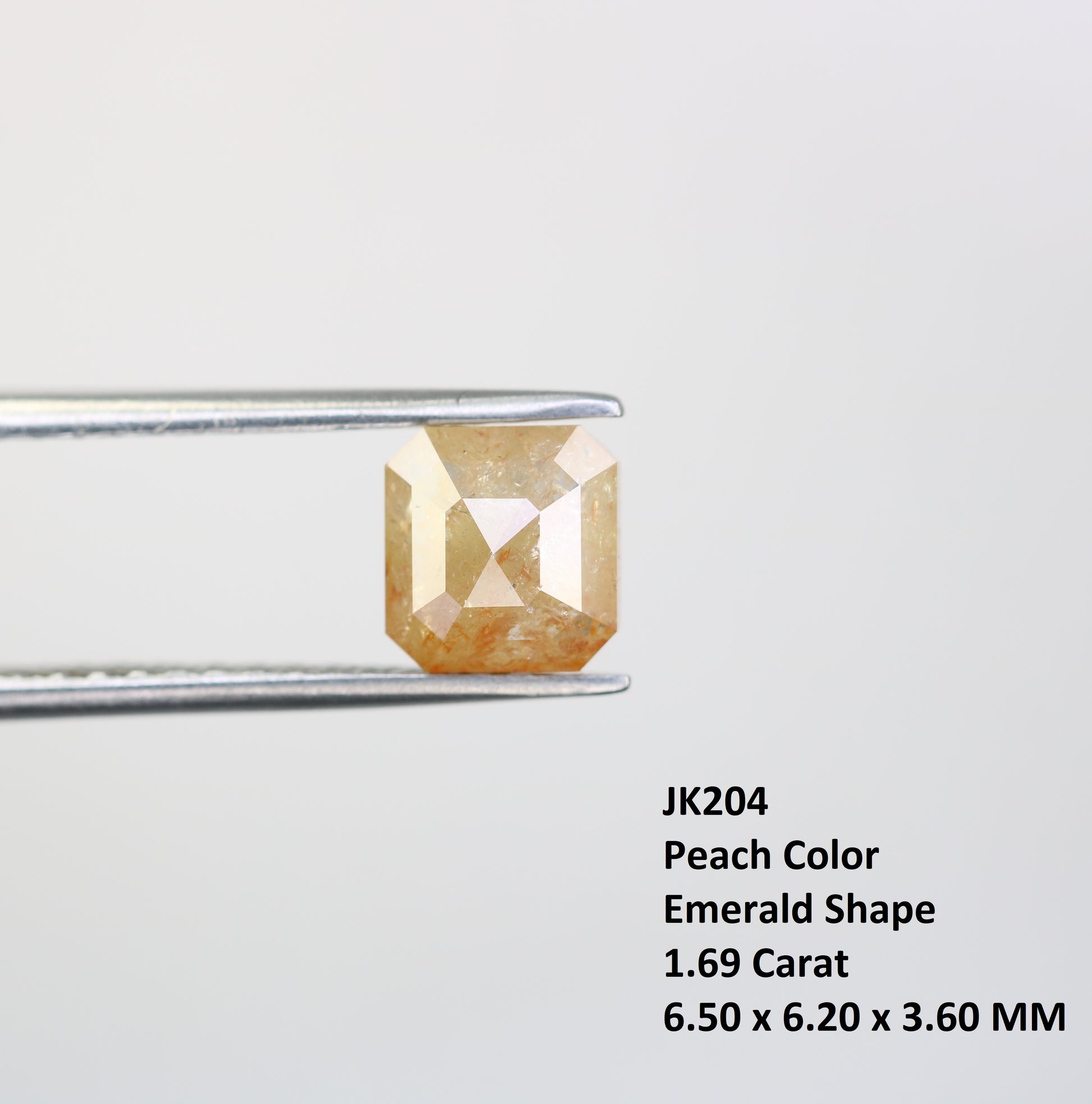 1.69 CT Emerald Shape Peach Diamond For Engagement Ring - JayKrishna Diamond