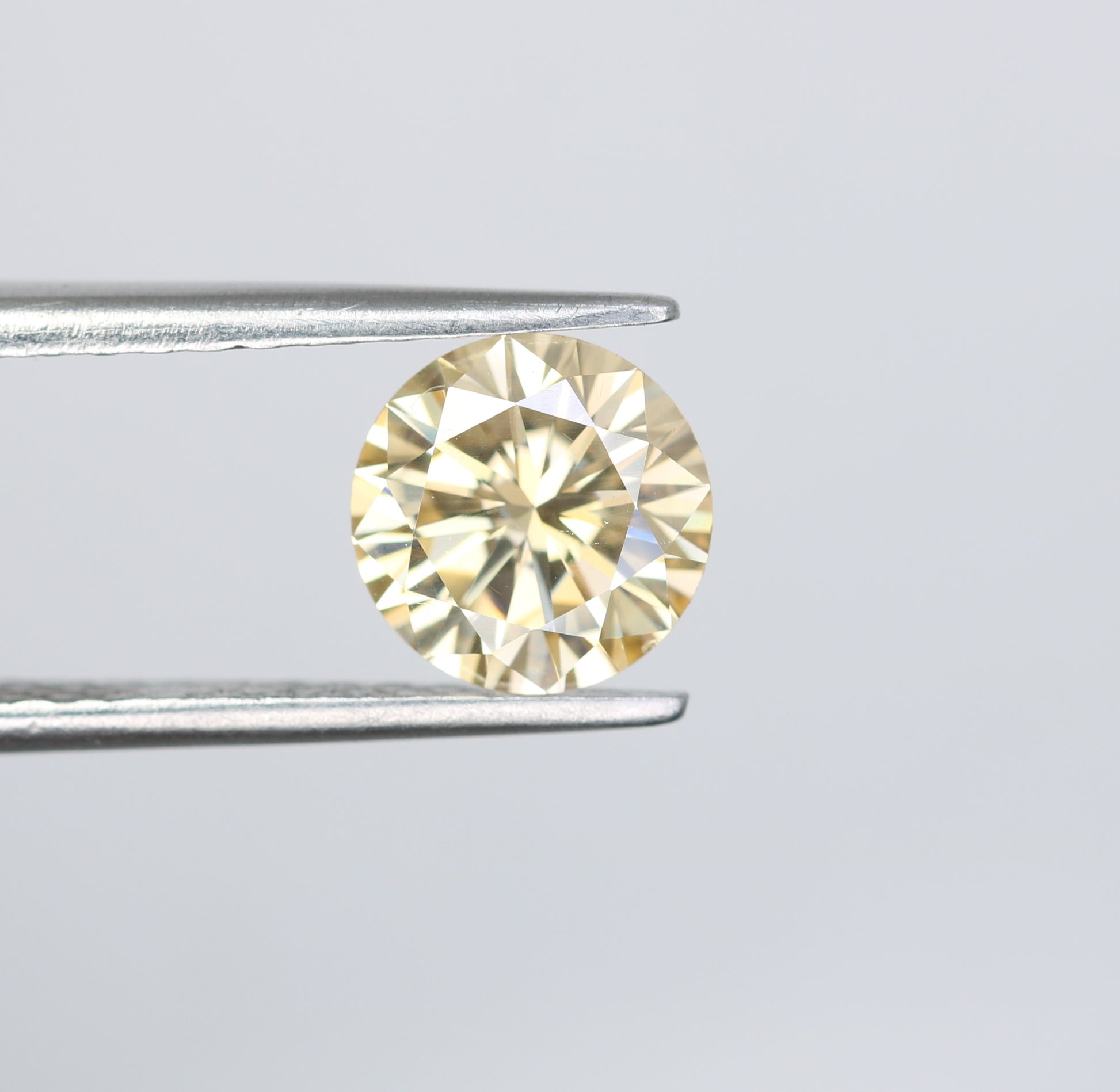 1.27 CT Light Orange Round Brilliant Cut Moissanite Diamond For Engagement Ring - JayKrishna Diamond