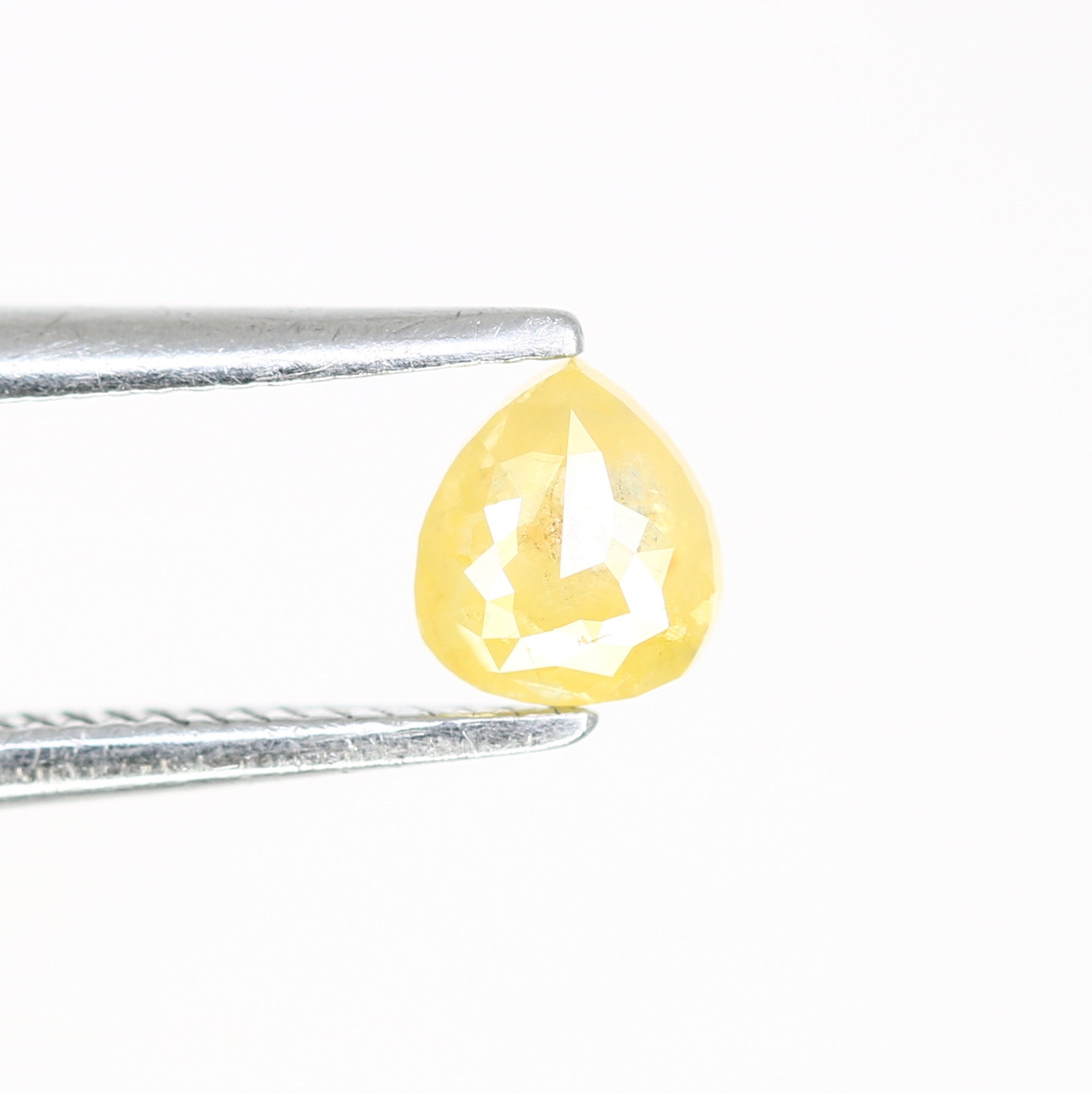 0.26 CT Fancy Yellow Pear Shape 4.40 MM Diamond – Ideal for Engagement Rings | Stunning Fancy Yellow Pear Diamond - JayKrishna Diamond
