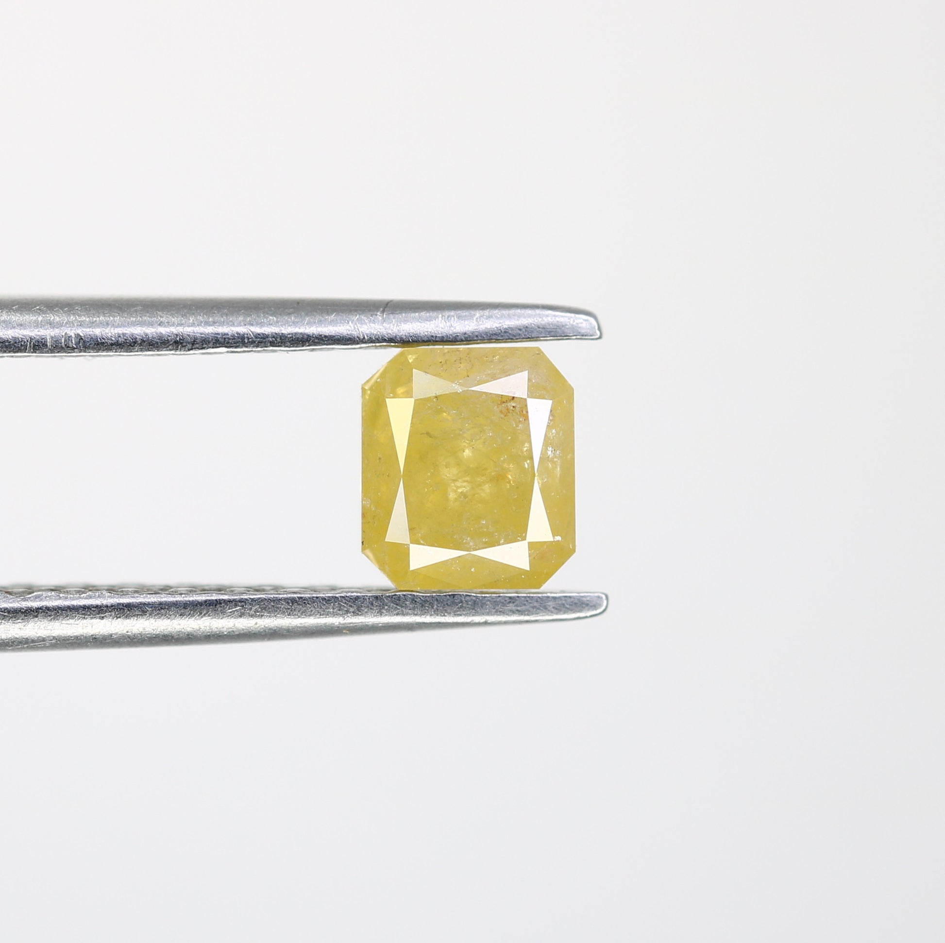 0.61 CT Asscher Shape Yellow Diamond for a Stunning Engagement Ring: Unique Gemstone Jewelry Piece - JayKrishna Diamond