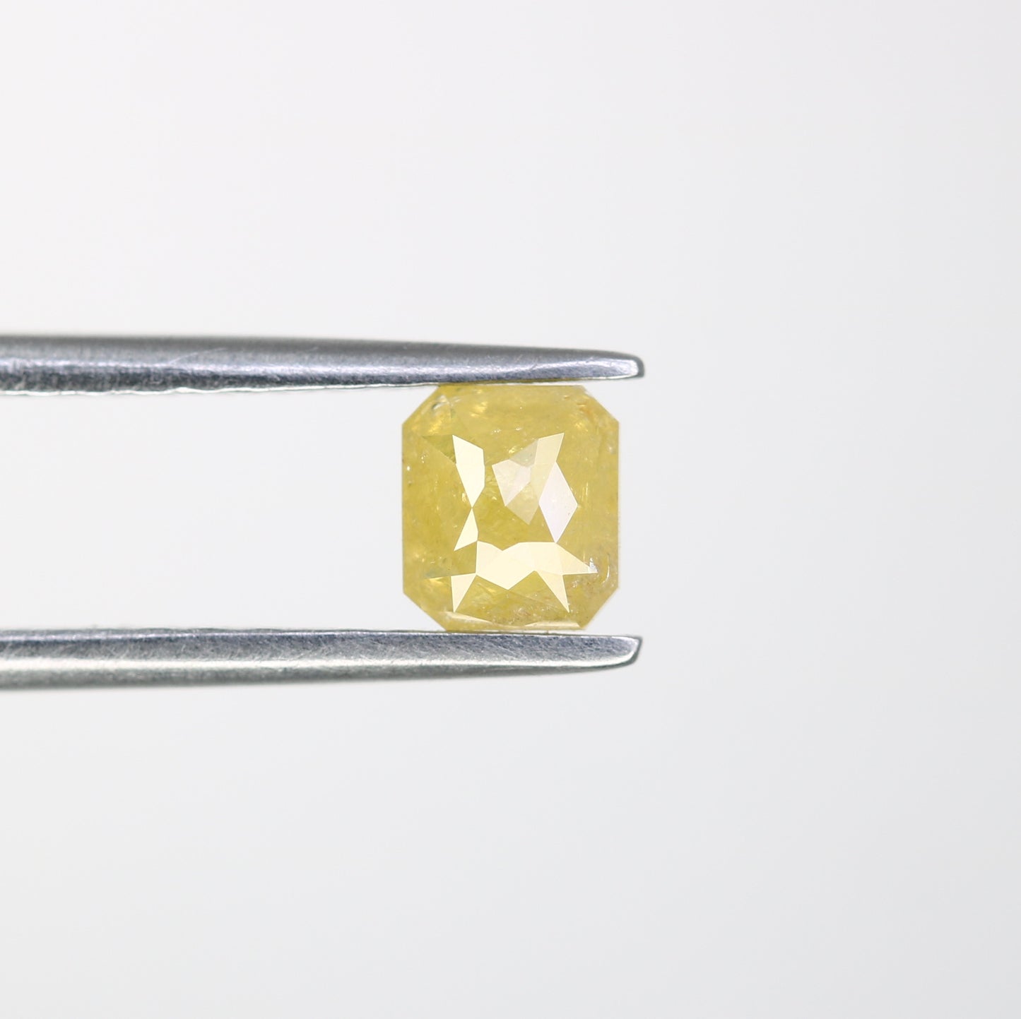 0.61 CT Asscher Shape Yellow Diamond for a Stunning Engagement Ring: Unique Gemstone Jewelry Piece - JayKrishna Diamond