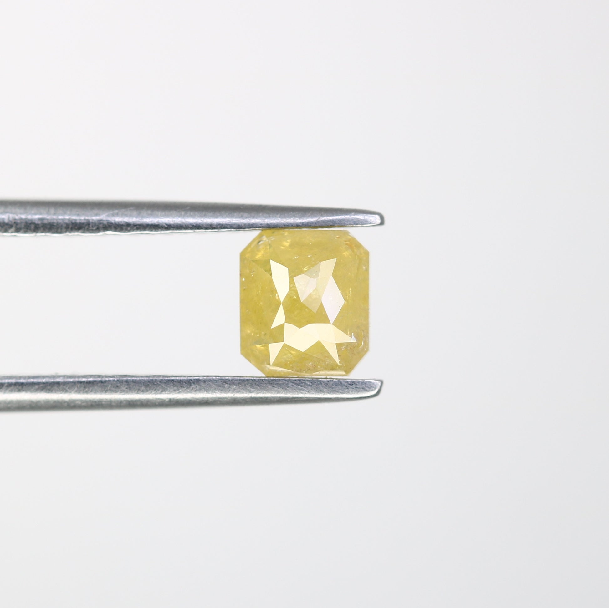 0.61 CT Asscher Shape Yellow Diamond for a Stunning Engagement Ring: Unique Gemstone Jewelry Piece - JayKrishna Diamond