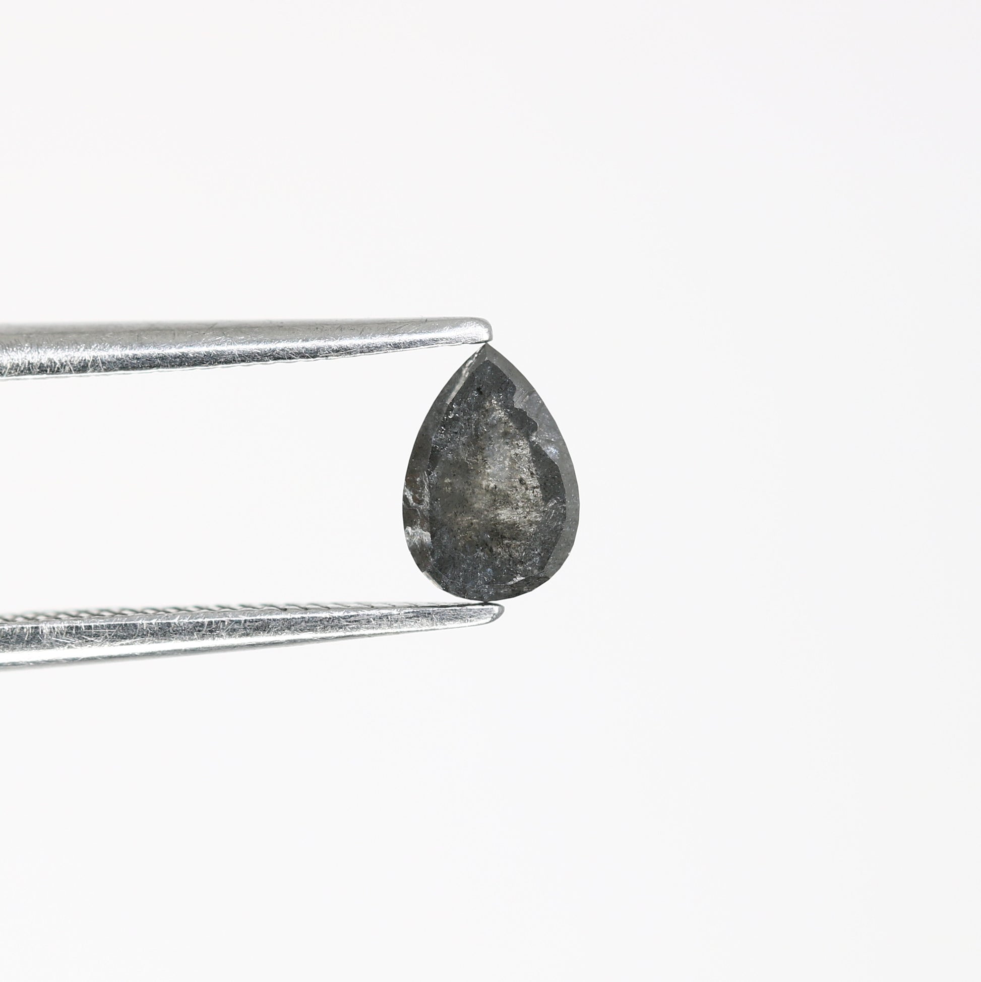 0.59 Carat Natural Salt and Pepper Pear-Shaped Diamond – Elegant Loose Gem for Unique Engagement Rings - JayKrishna Diamond