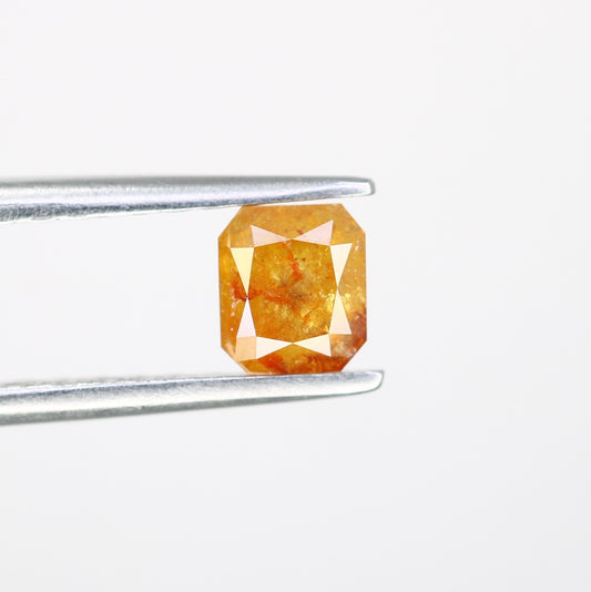 0.64 CT Emerald Shape Peach Diamond for a Stunning Engagement Ring: Distinctive Gemstone Jewelry Piece - JayKrishna Diamond