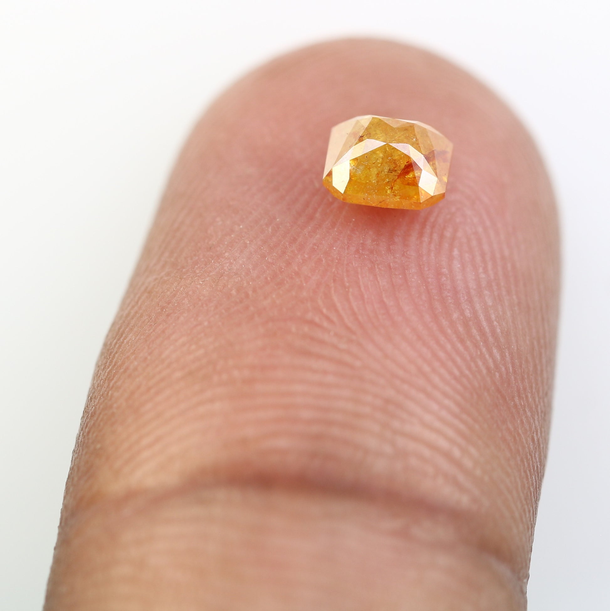 0.64 CT Emerald Shape Peach Diamond for a Stunning Engagement Ring: Distinctive Gemstone Jewelry Piece - JayKrishna Diamond