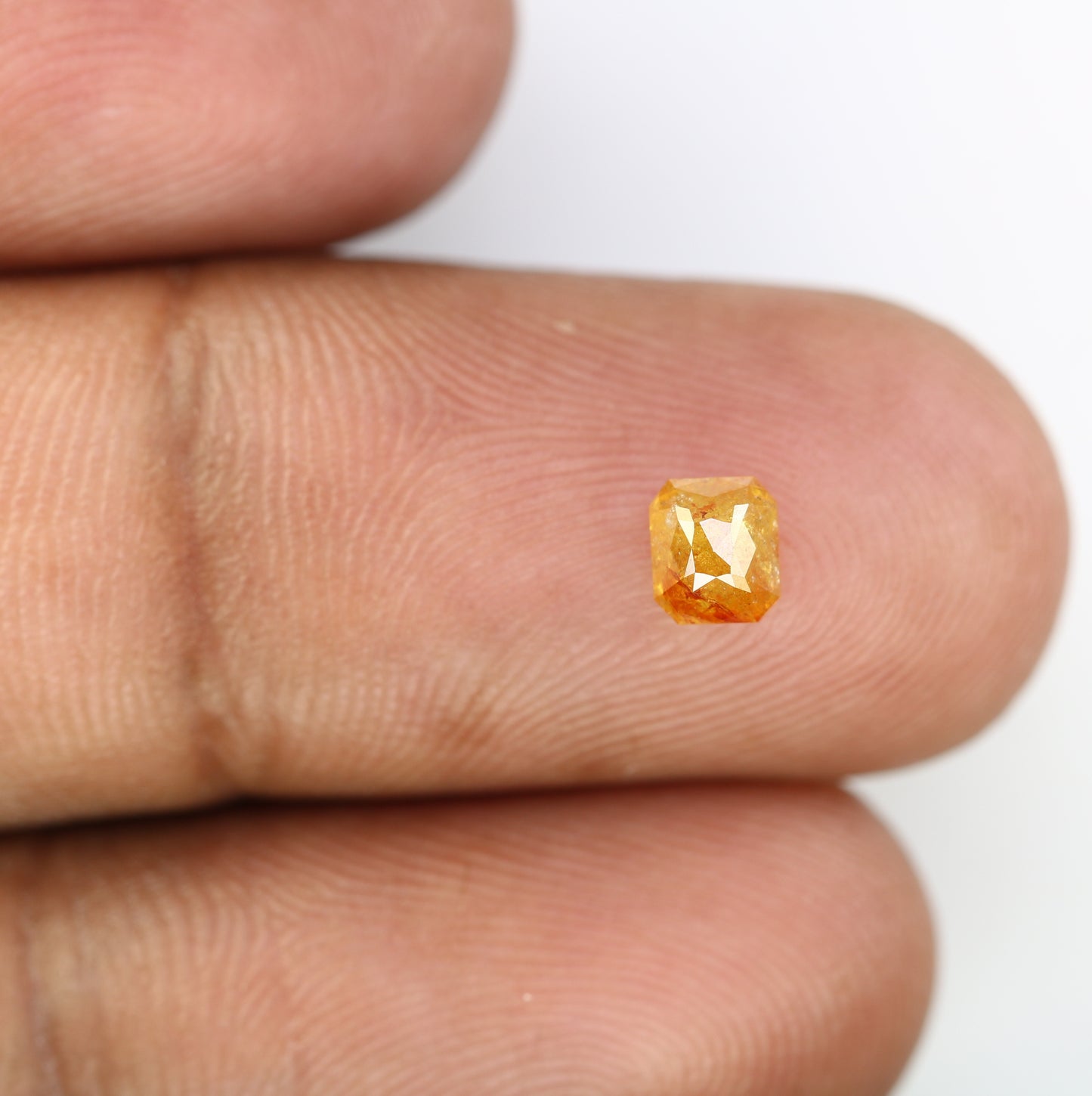 0.64 CT Emerald Shape Peach Diamond for a Stunning Engagement Ring: Distinctive Gemstone Jewelry Piece - JayKrishna Diamond