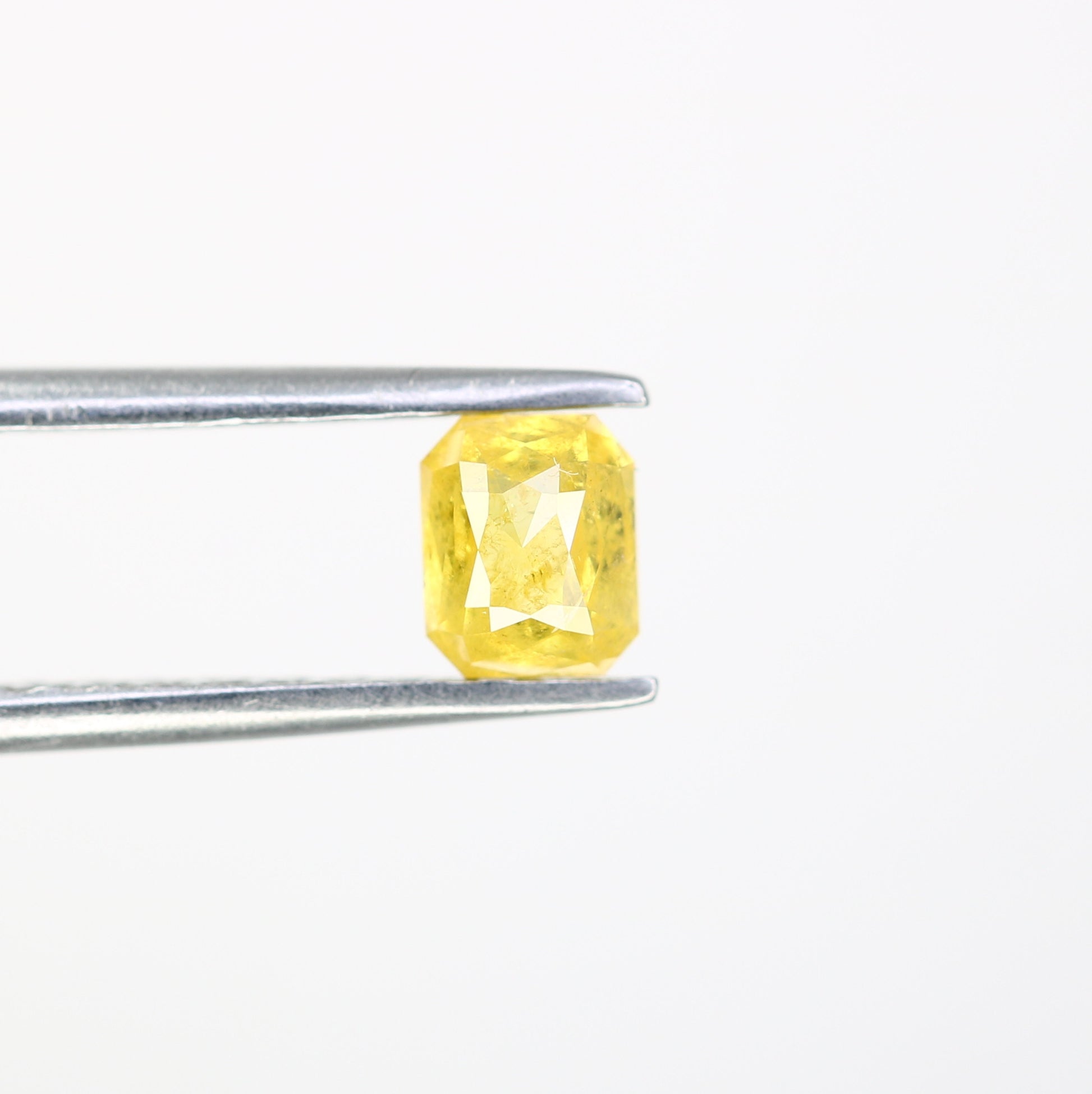 0.58 CT Natural Yellow Emerald-Shaped Diamond – Elegant Loose Gem for Stunning Engagement Rings - JayKrishna Diamond