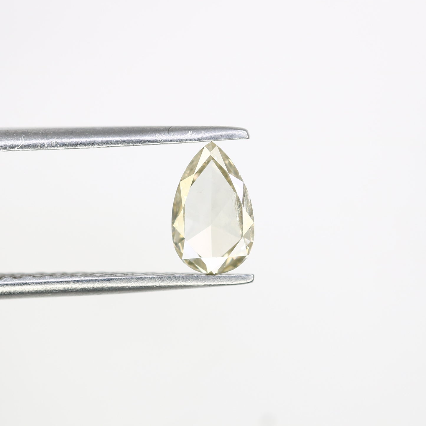 0.57 CT Fancy Light Yellow Pear-Shaped Diamond – Radiant Loose Gem for Celestial Galaxy Rings - JayKrishna Diamond