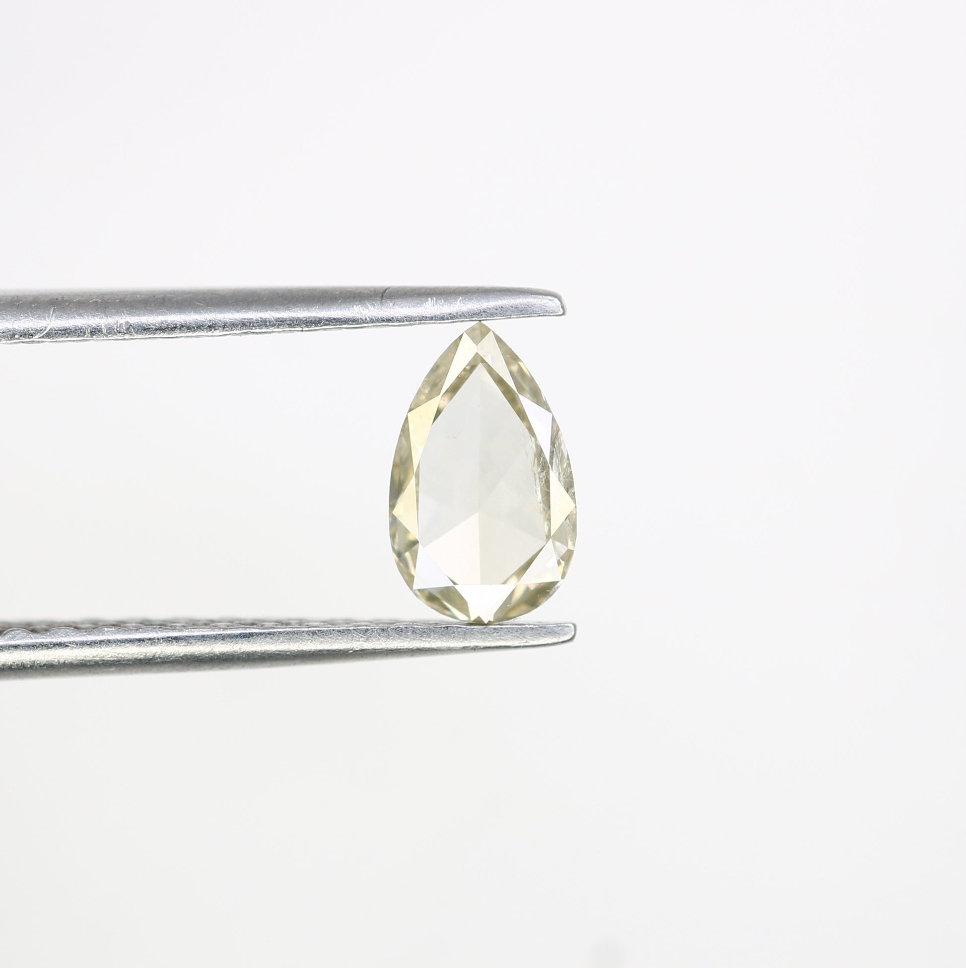 0.57 CT Fancy Light Yellow Pear-Shaped Diamond – Radiant Loose Gem for Celestial Galaxy Rings - JayKrishna Diamond