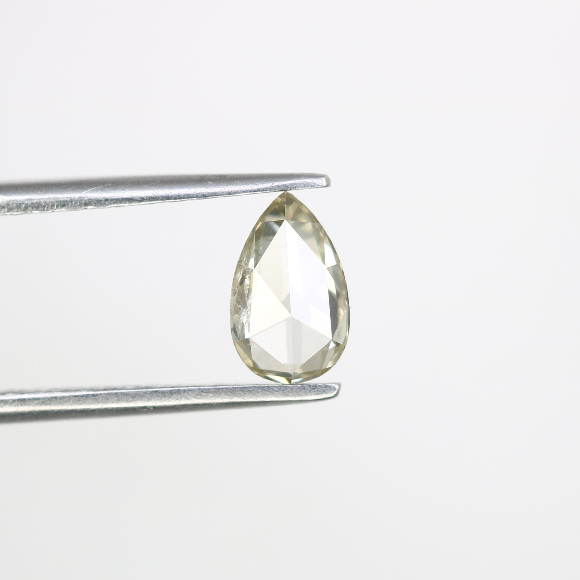0.57 CT Fancy Light Yellow Pear-Shaped Diamond – Radiant Loose Gem for Celestial Galaxy Rings - JayKrishna Diamond