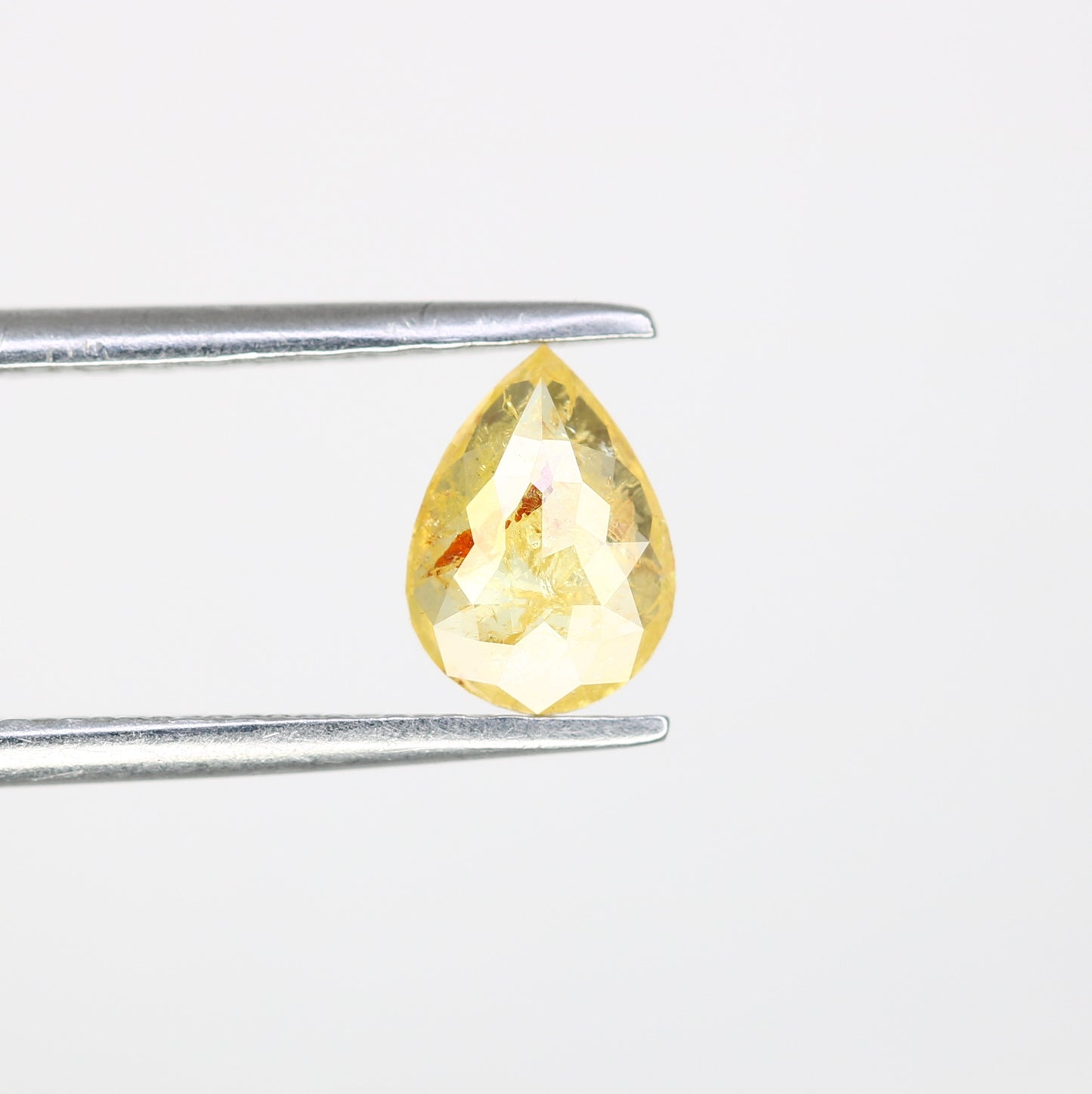 0.62 CT Pear Cut Natural Yellow Diamond (6.90 MM) for a Striking Engagement Ring: Distinctive Gemstone Jewelry Piece - JayKrishna Diamond