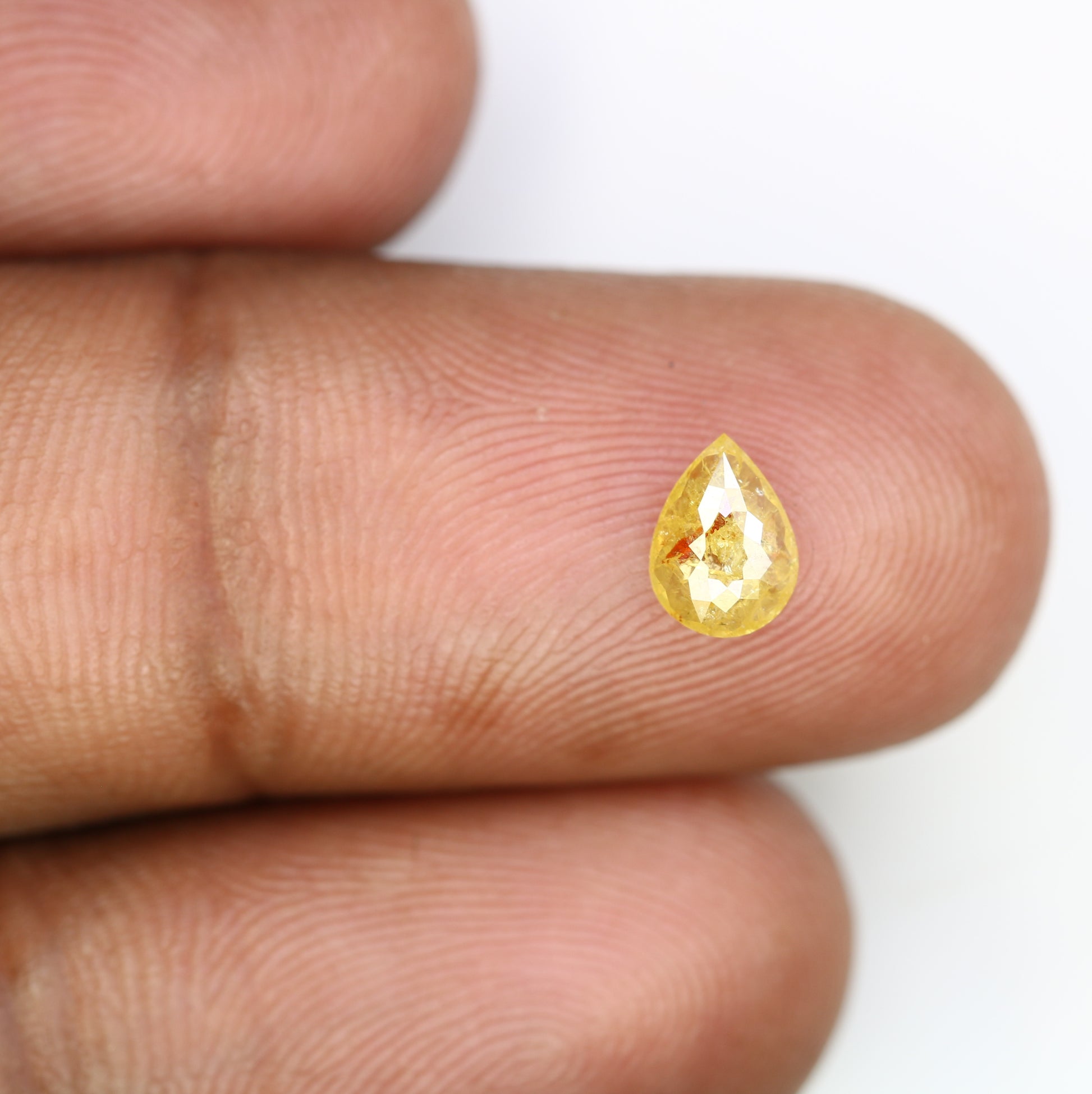 0.62 CT Pear Cut Natural Yellow Diamond (6.90 MM) for a Striking Engagement Ring: Distinctive Gemstone Jewelry Piece - JayKrishna Diamond