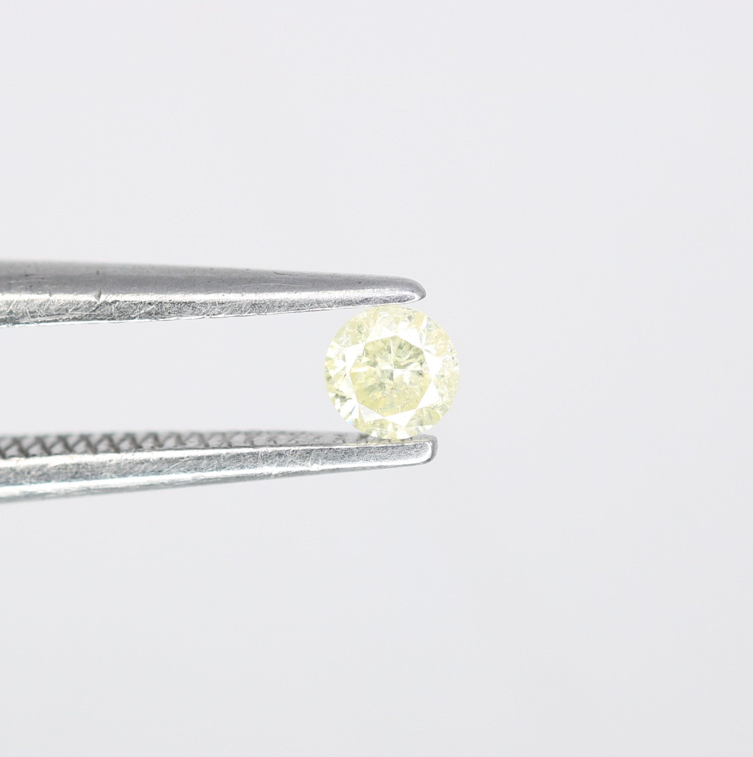 0.11 CT Natural Light Yellow Round Brilliant Cut Salt and Pepper Diamond for Engagement Rings, Custom Jewelry and Chic Bracelets - JayKrishna Diamond