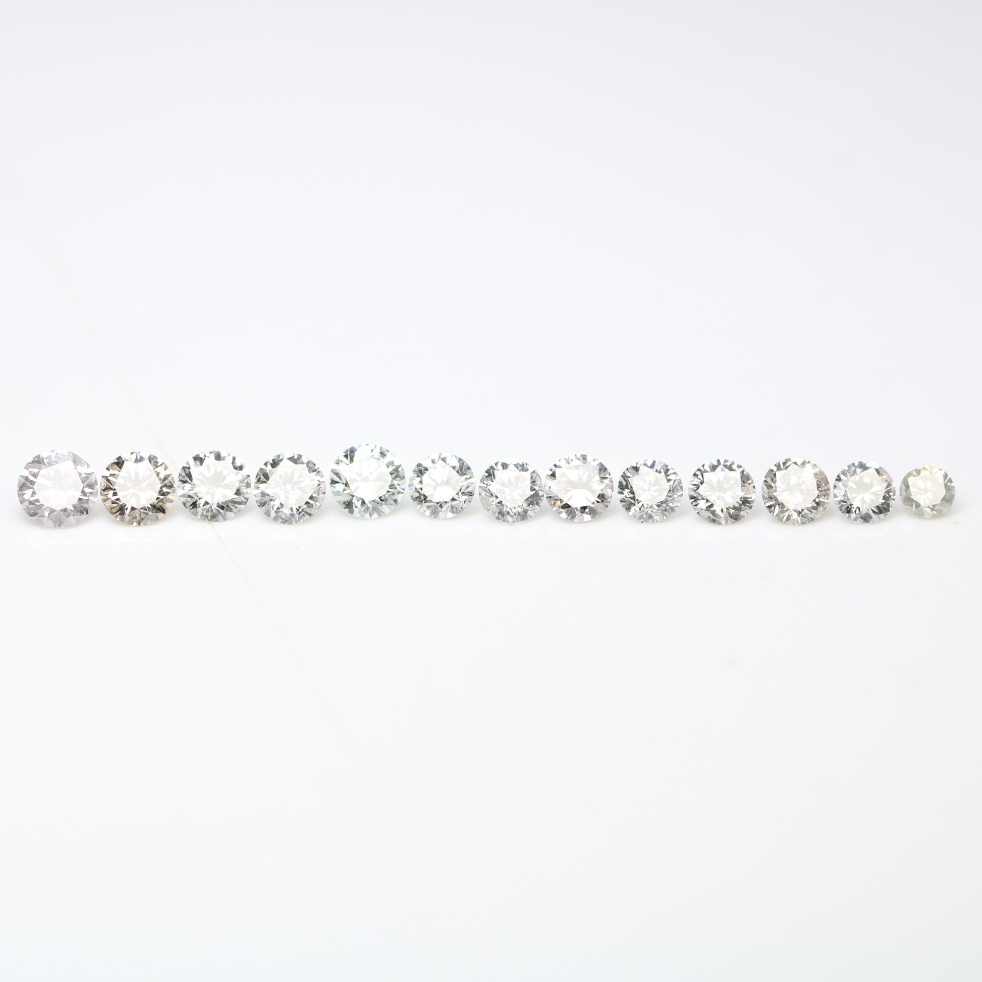 0.61 CT Round Brilliant Cut Light Mix Diamonds (1.70 to 2.60 MM) for an Elegant Engagement Ring: Unique Gemstone Collection - JayKrishna Diamond